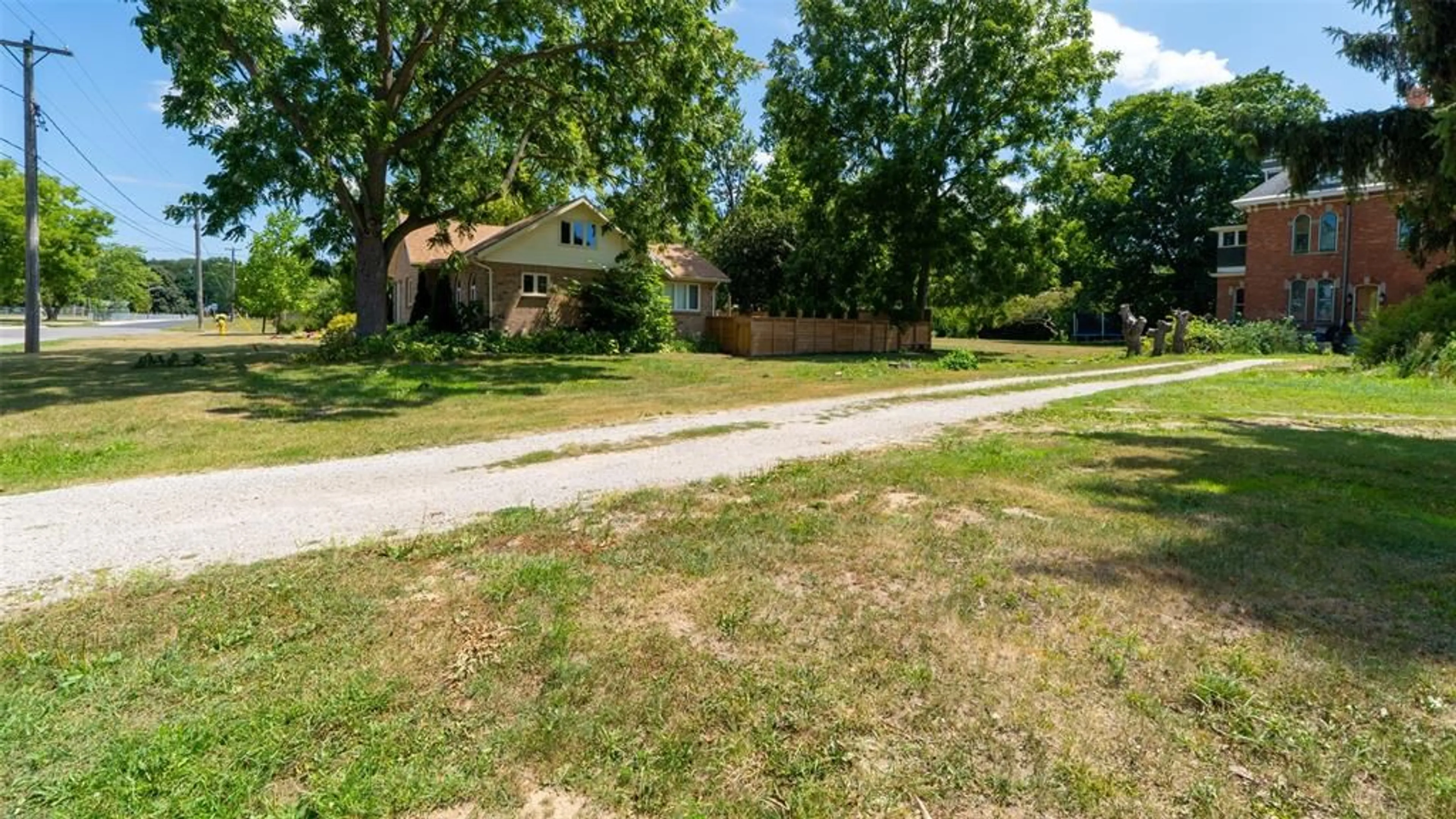 A pic from outside/outdoor area/front of a property/back of a property/a pic from drone, street for 45 Mary St, Thamesville Ontario N0P 2K0