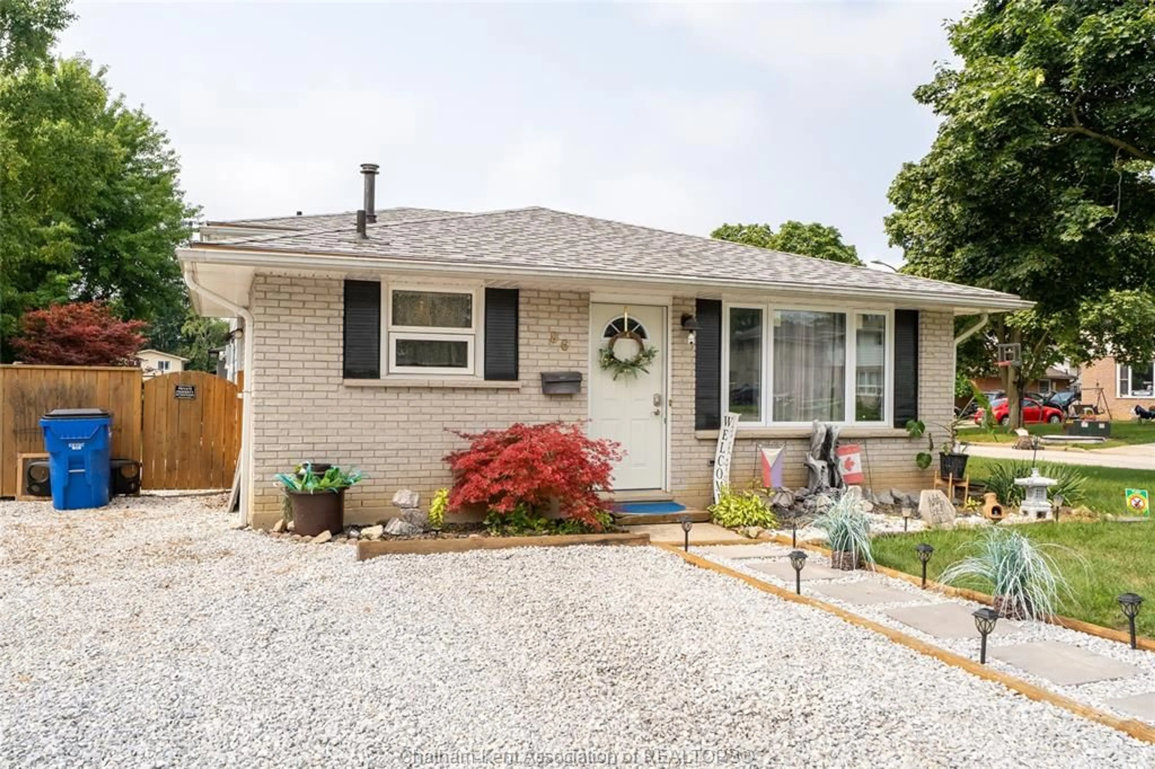 Home with brick exterior material, street for 86 Marion Ave, Chatham Ontario N7M 5N3