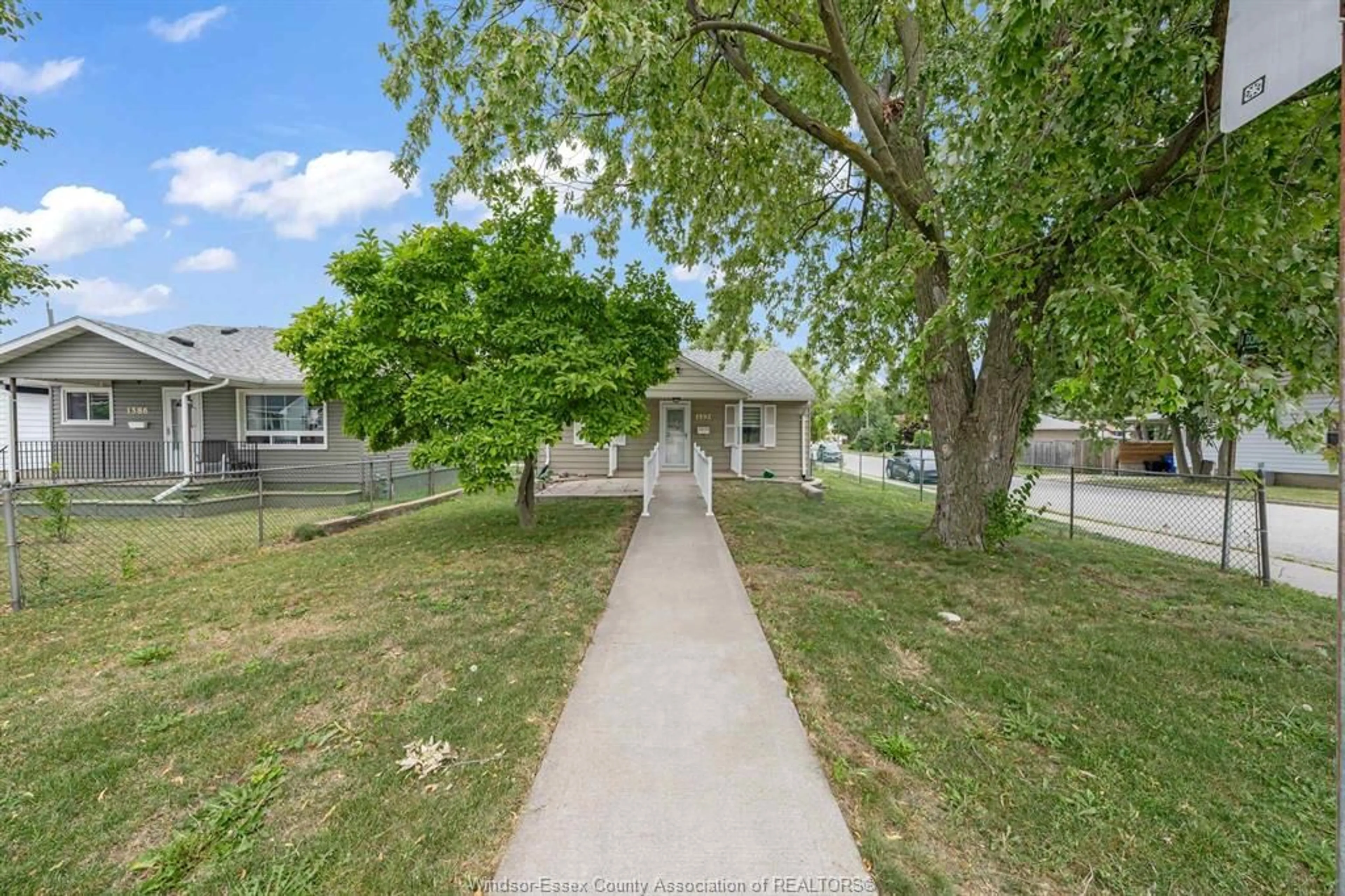 A pic from outside/outdoor area/front of a property/back of a property/a pic from drone, street for 1592 Prince Rd, Windsor Ontario N9C 3B3