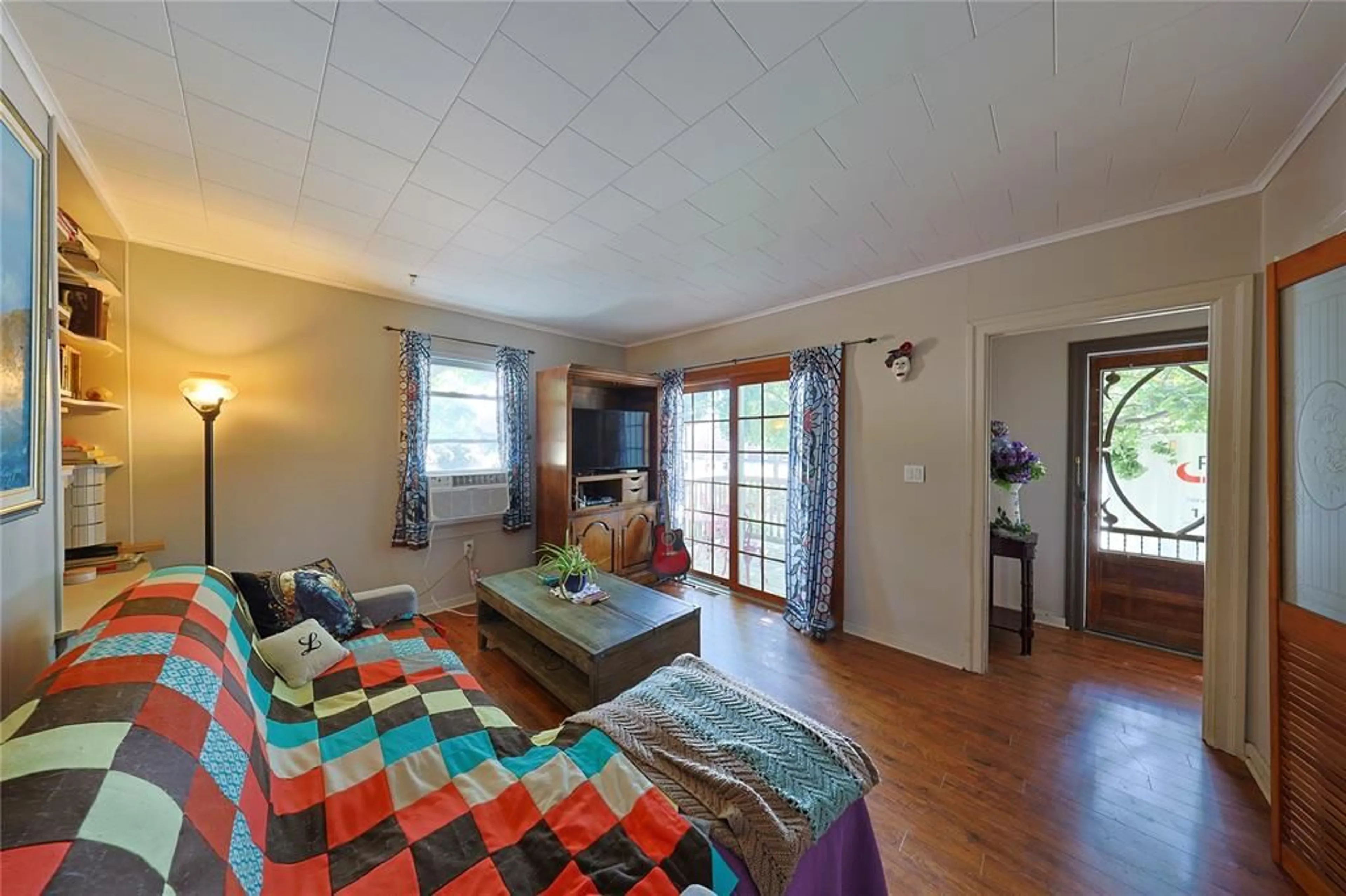 Living room with furniture, wood/laminate floor for 304 LORNE Ave, Wallaceburg Ontario N8A 3Z3