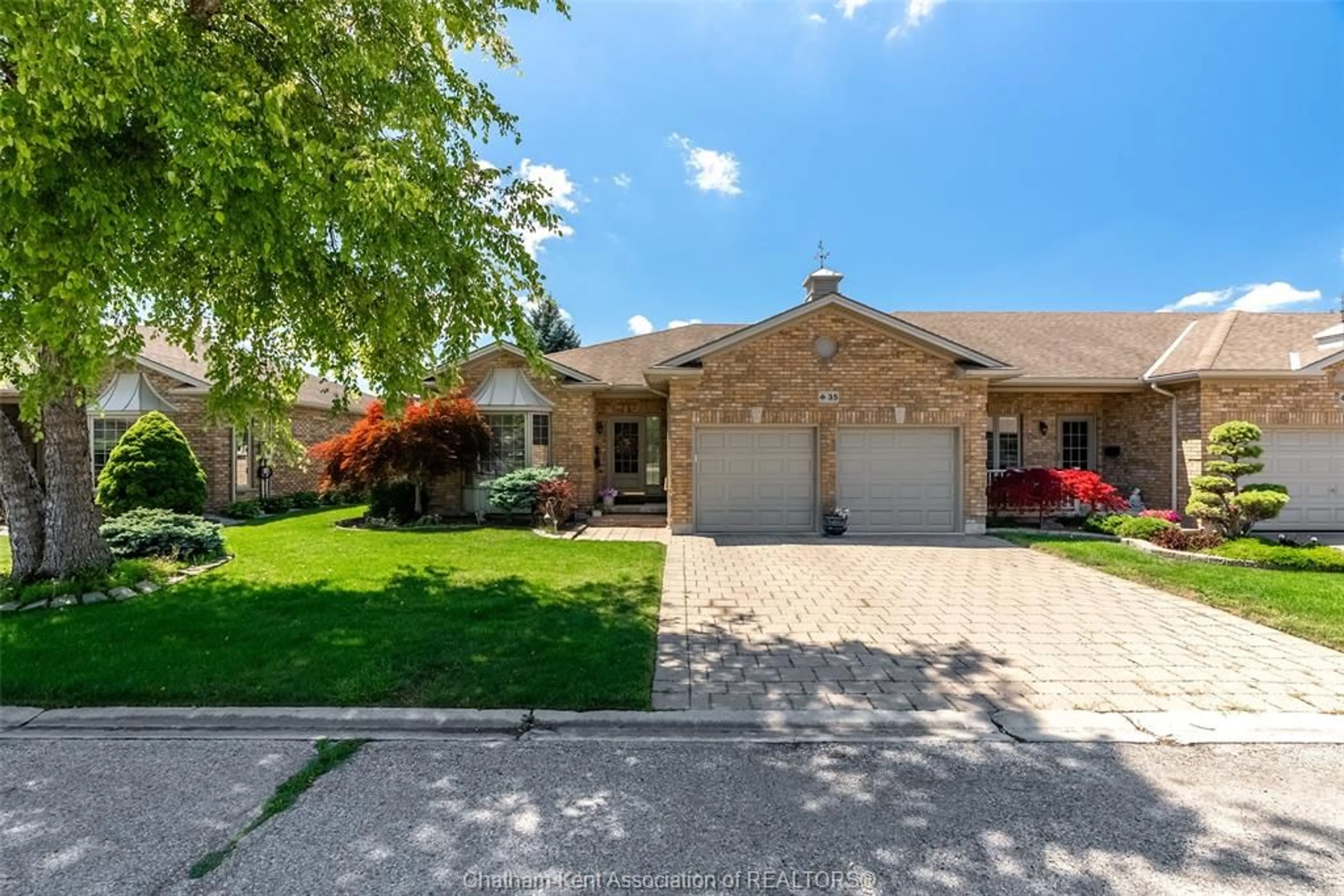Home with brick exterior material, street for 35 HOME Pl, Chatham Ontario N7L 5P4