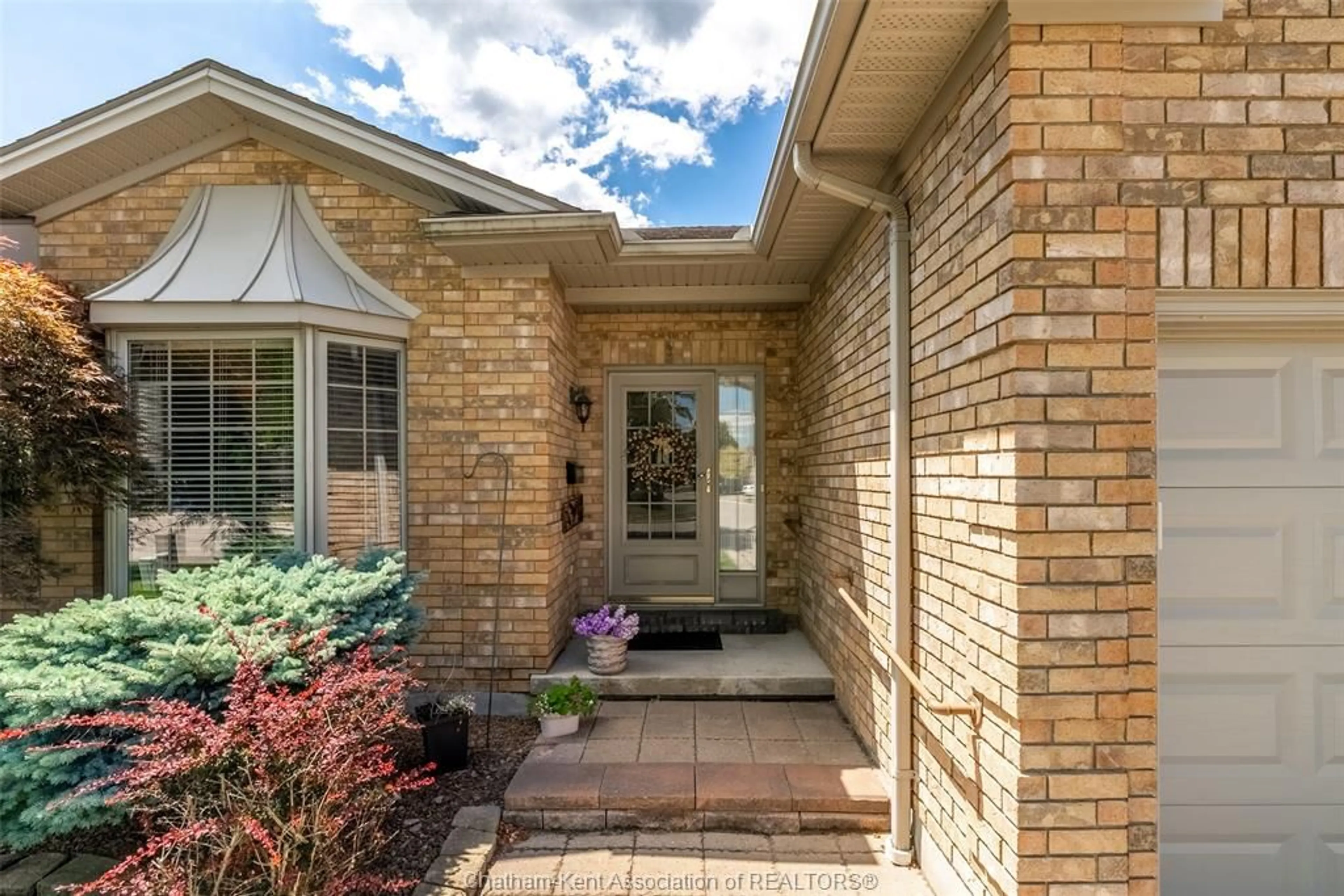 Home with brick exterior material, street for 35 HOME Pl, Chatham Ontario N7L 5P4
