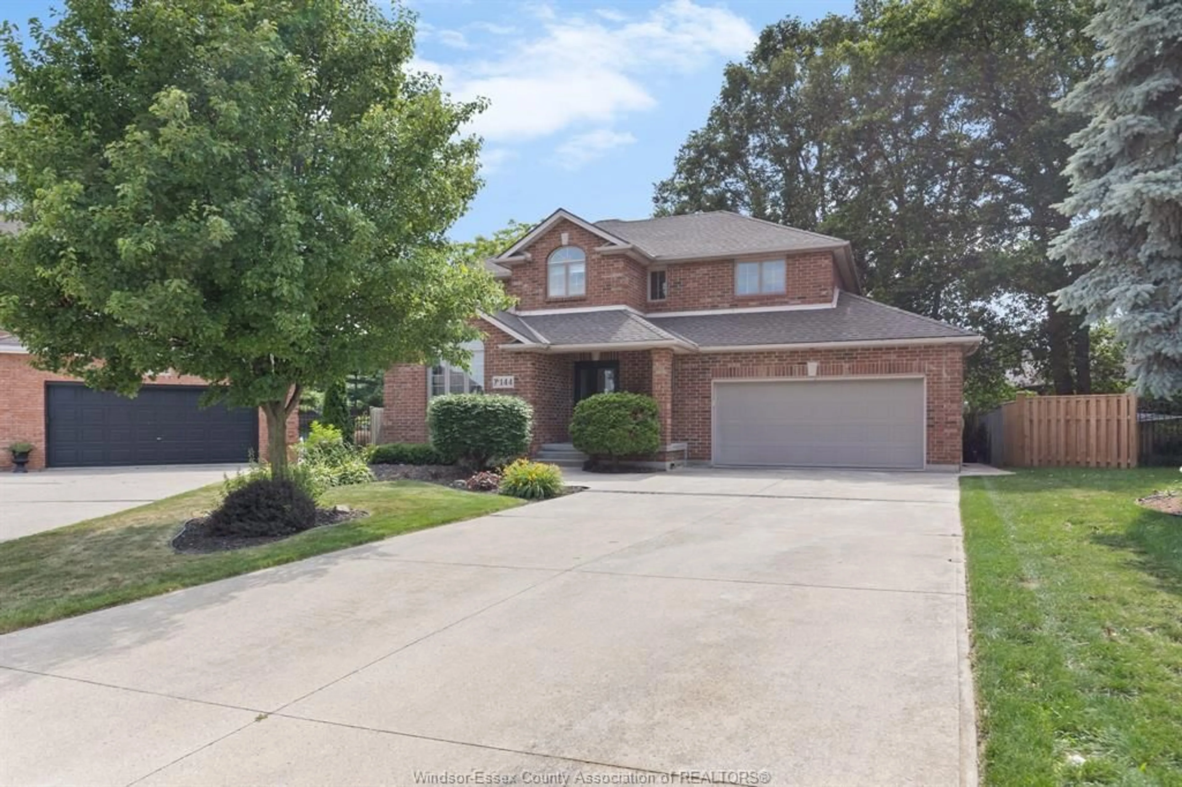 Home with brick exterior material, street for 144 Pheasant Run, Lakeshore Ontario N8L 0Z7