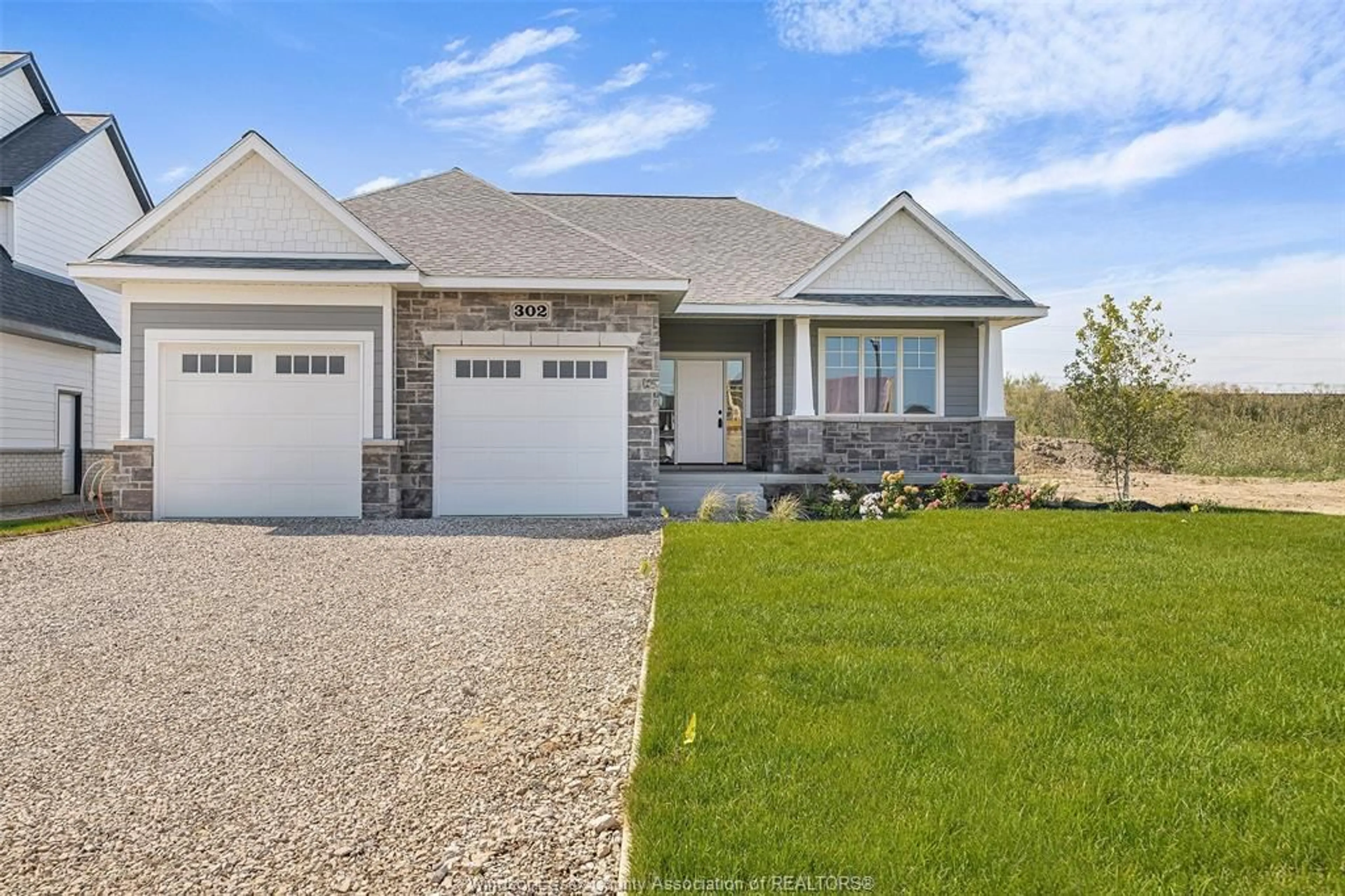 Home with brick exterior material, street for 48 BELLEVIEW Dr, Kingsville Ontario N0R 1B0