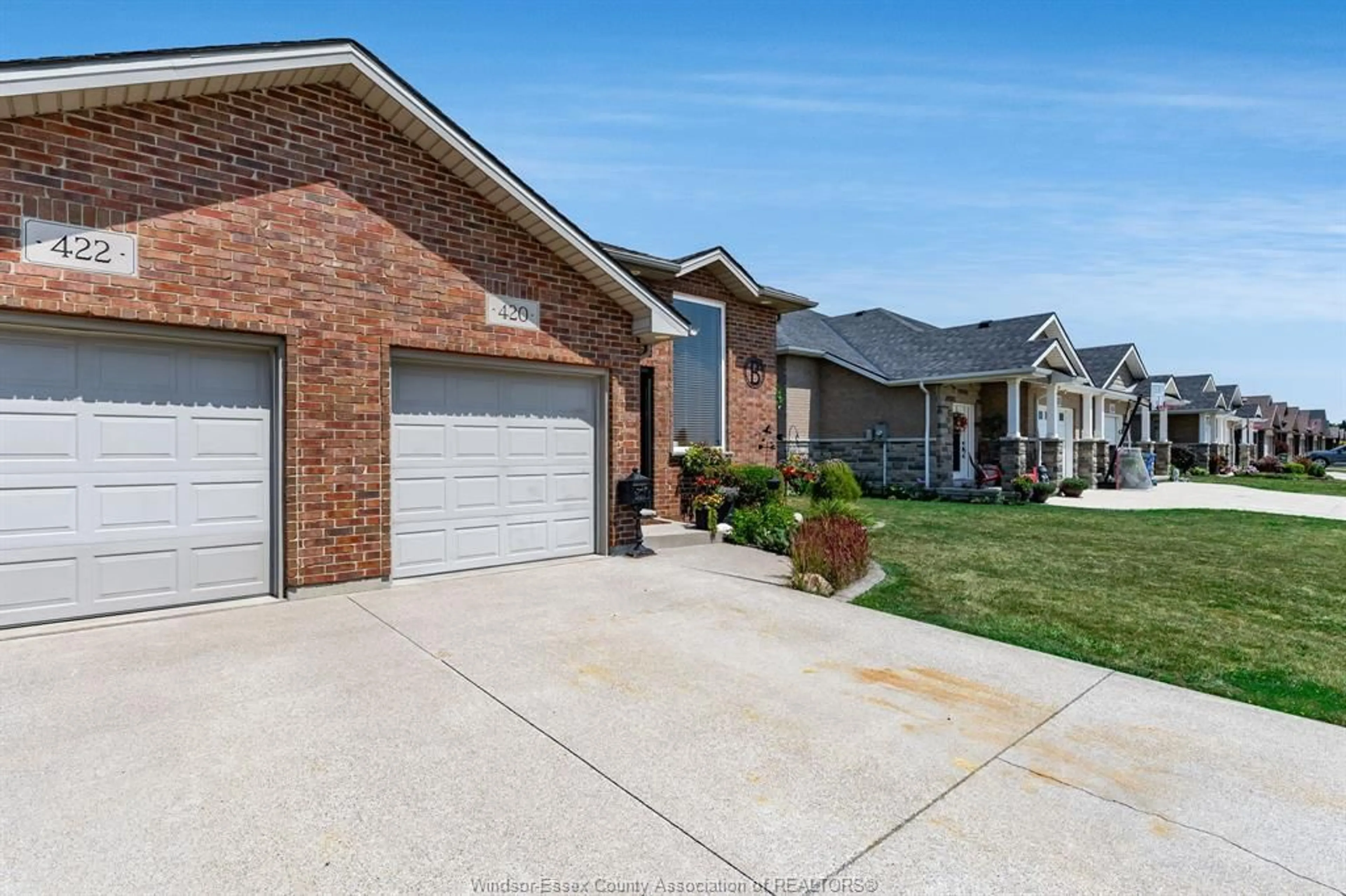 Home with brick exterior material, street for 420 MARLA Cres, Lakeshore Ontario N8L 1B9