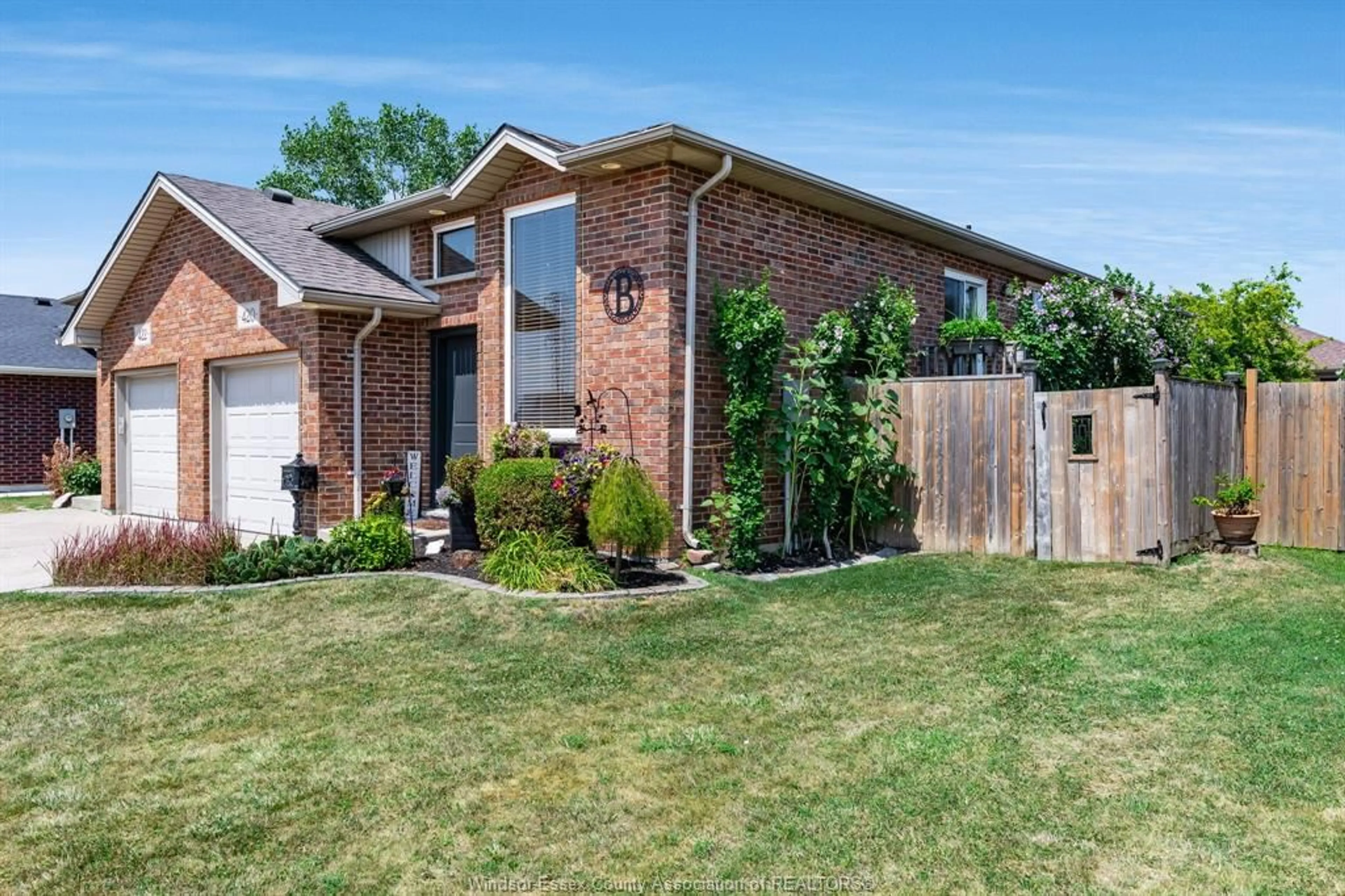 Home with brick exterior material, street for 420 MARLA Cres, Lakeshore Ontario N8L 1B9