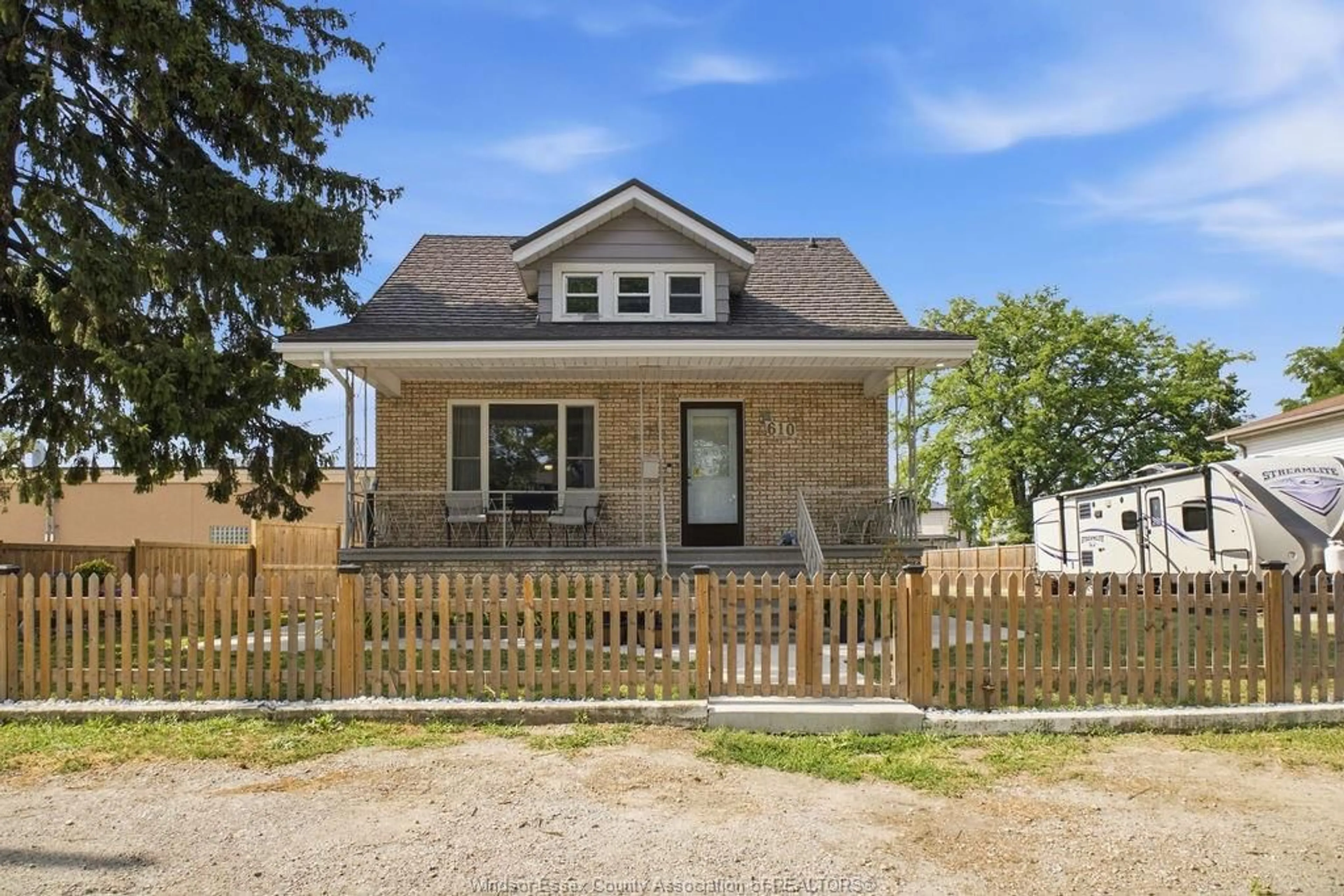 Home with brick exterior material, street for 610 BRAZIL Ave, Windsor Ontario N8X 2X5