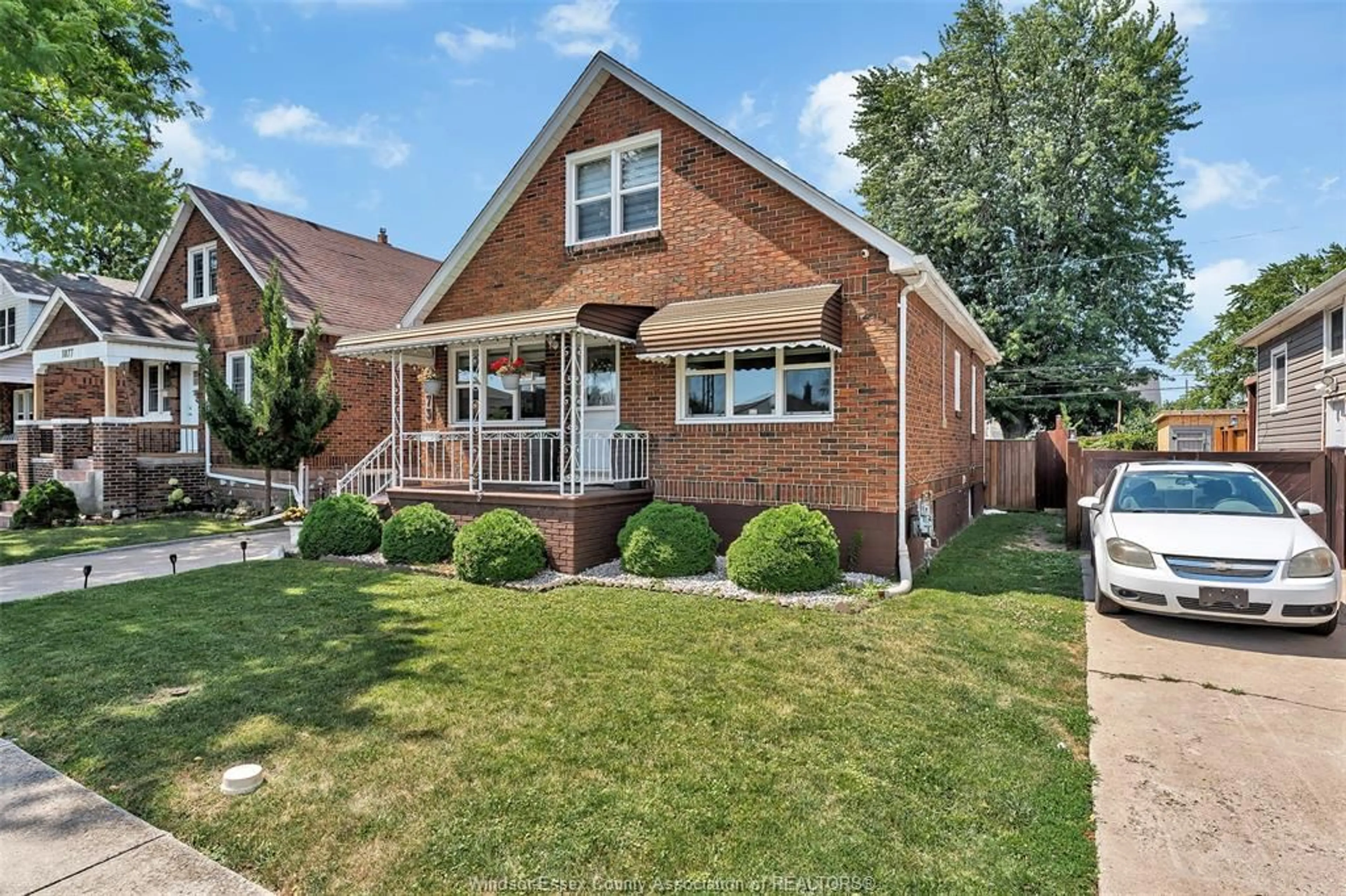 Home with brick exterior material, street for 1873 Alexis Rd, Windsor Ontario N8W 3Y7