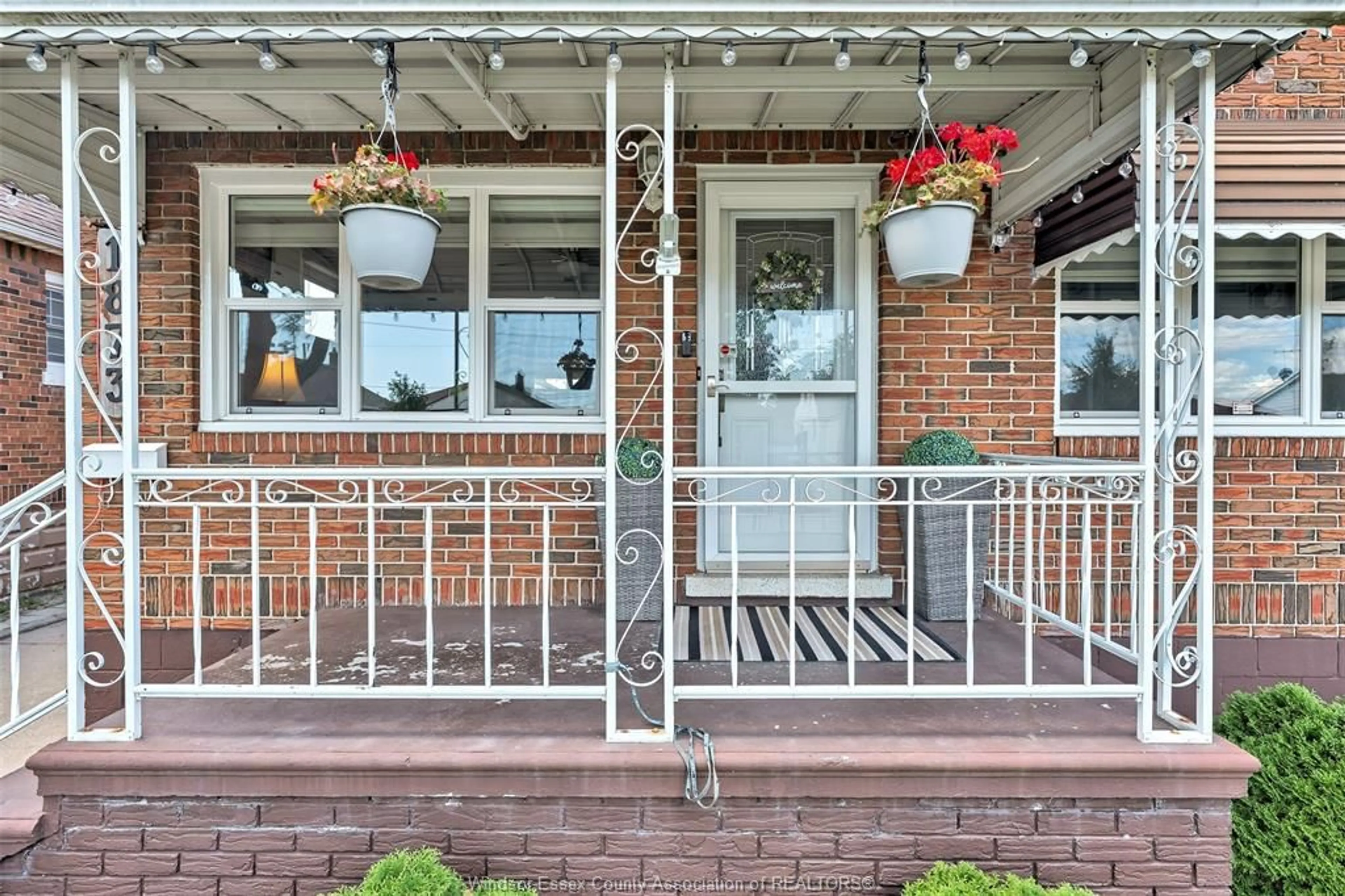 Home with brick exterior material, street for 1873 Alexis Rd, Windsor Ontario N8W 3Y7