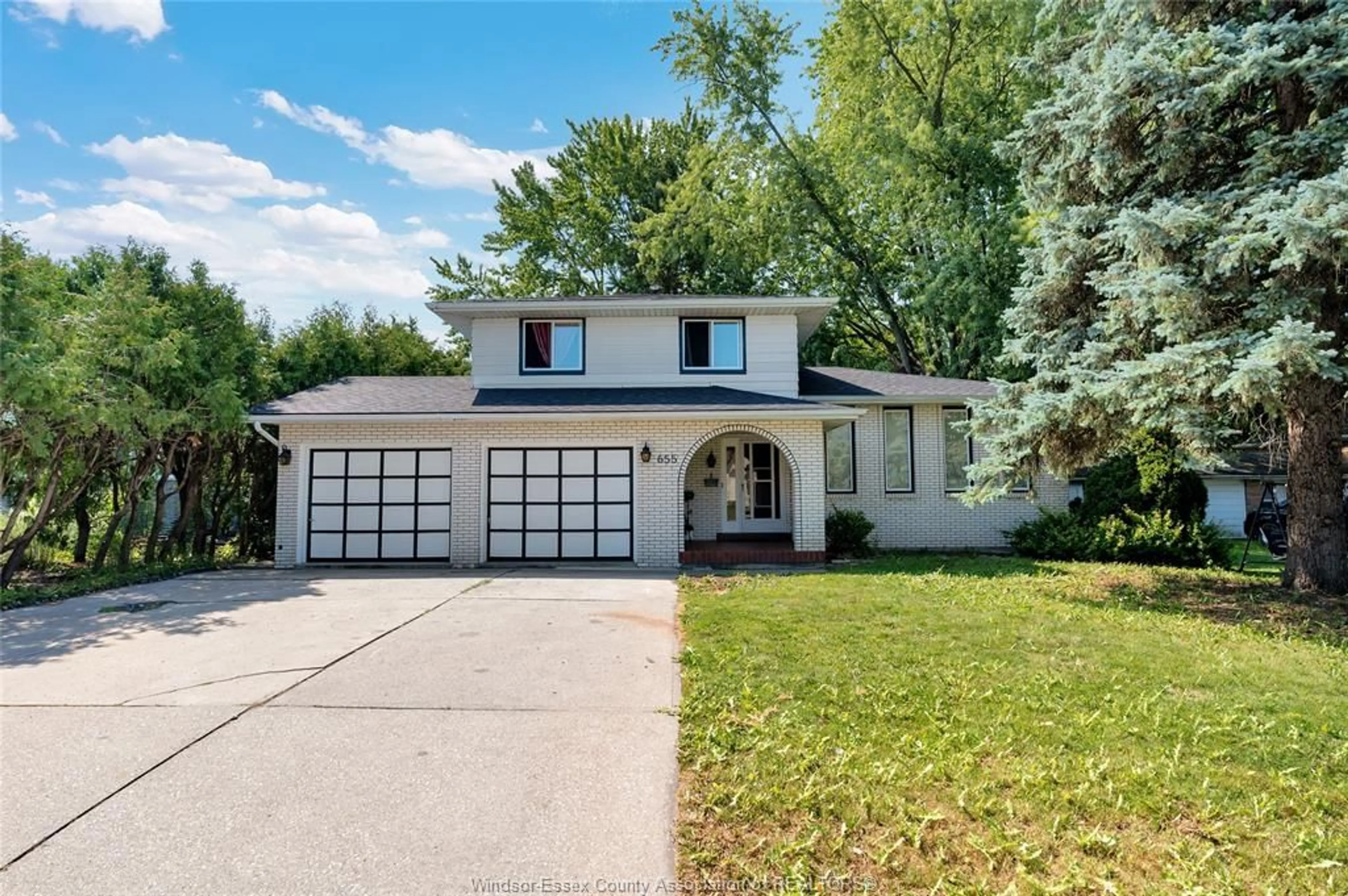 Home with vinyl exterior material, street for 655 ROSELAND Dr, Windsor Ontario N9G 1T7