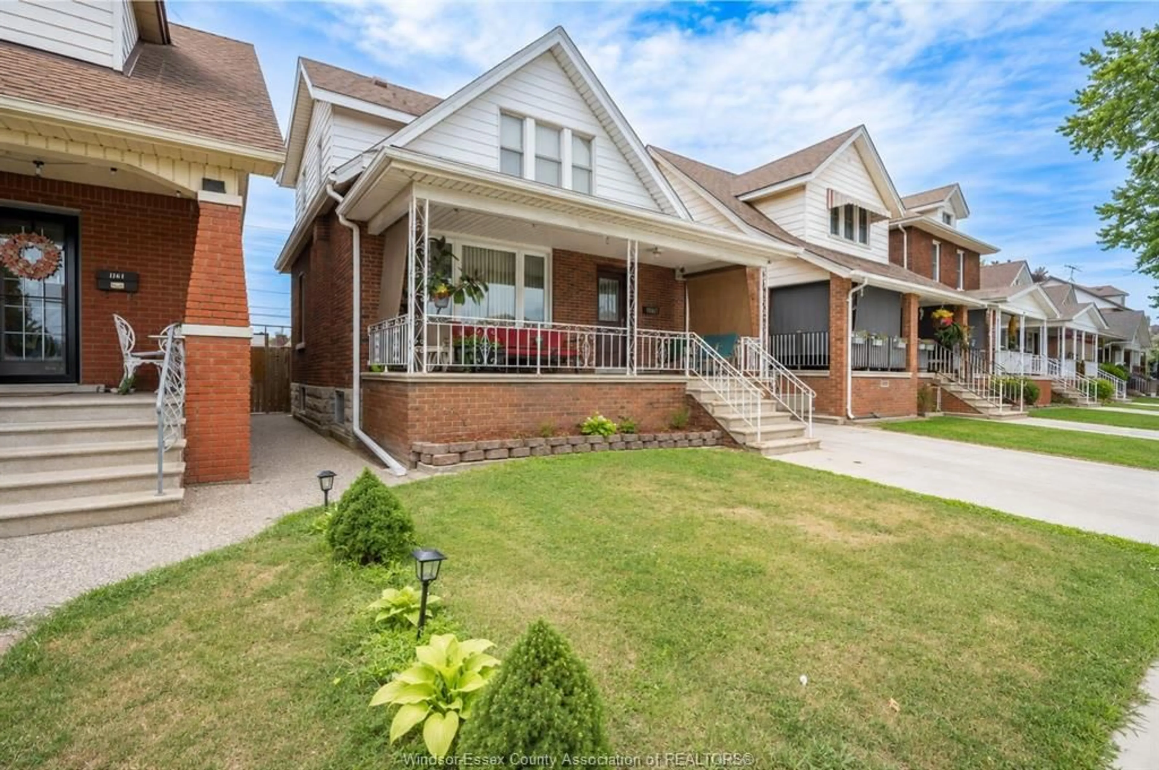 Home with brick exterior material, street for 1163 Louis Ave, Windsor Ontario N9A 1Y1