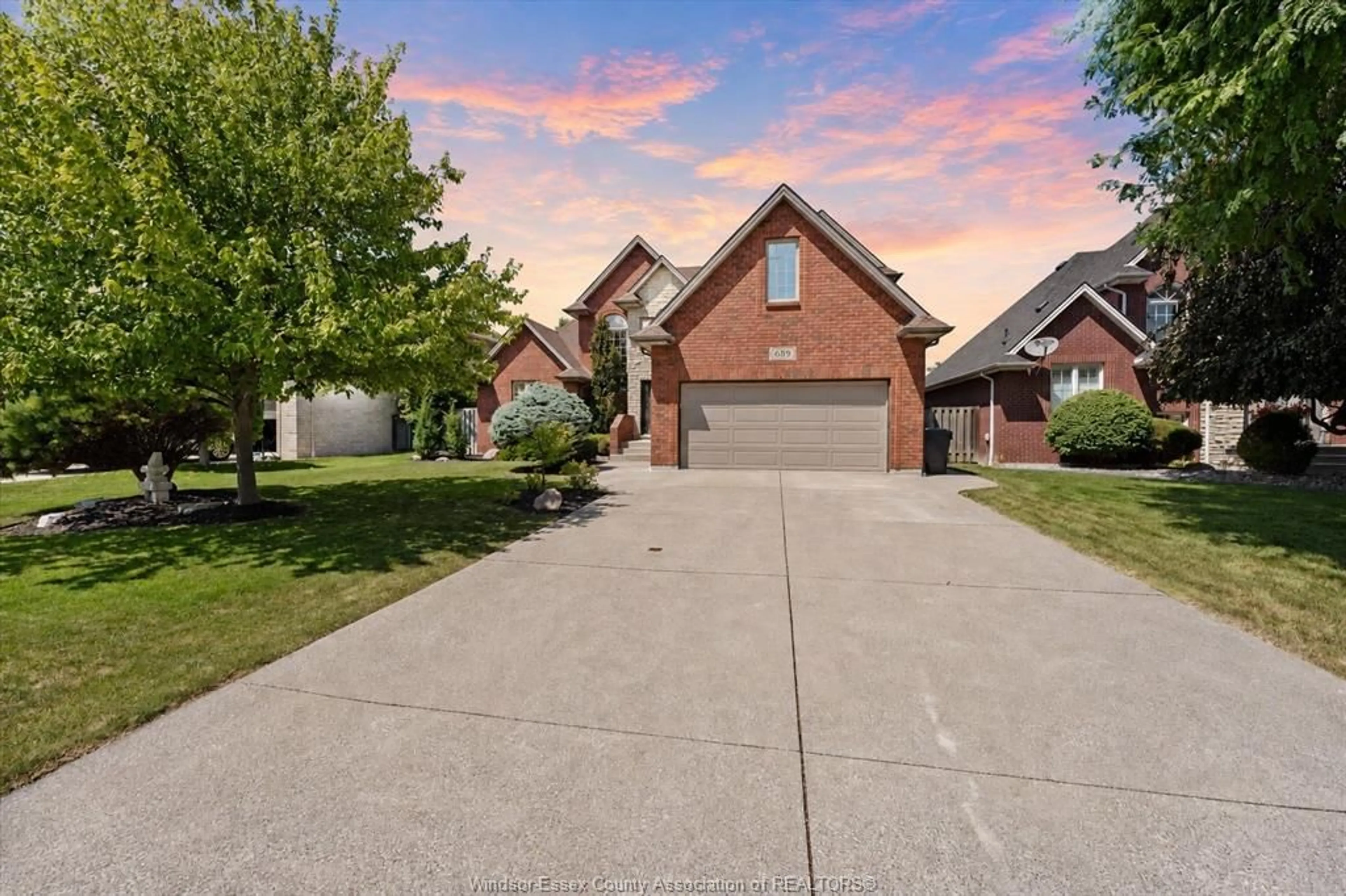 A pic from outside/outdoor area/front of a property/back of a property/a pic from drone, street for 689 GEORGE KENNEDY Way, Lakeshore Ontario N8L 1A3