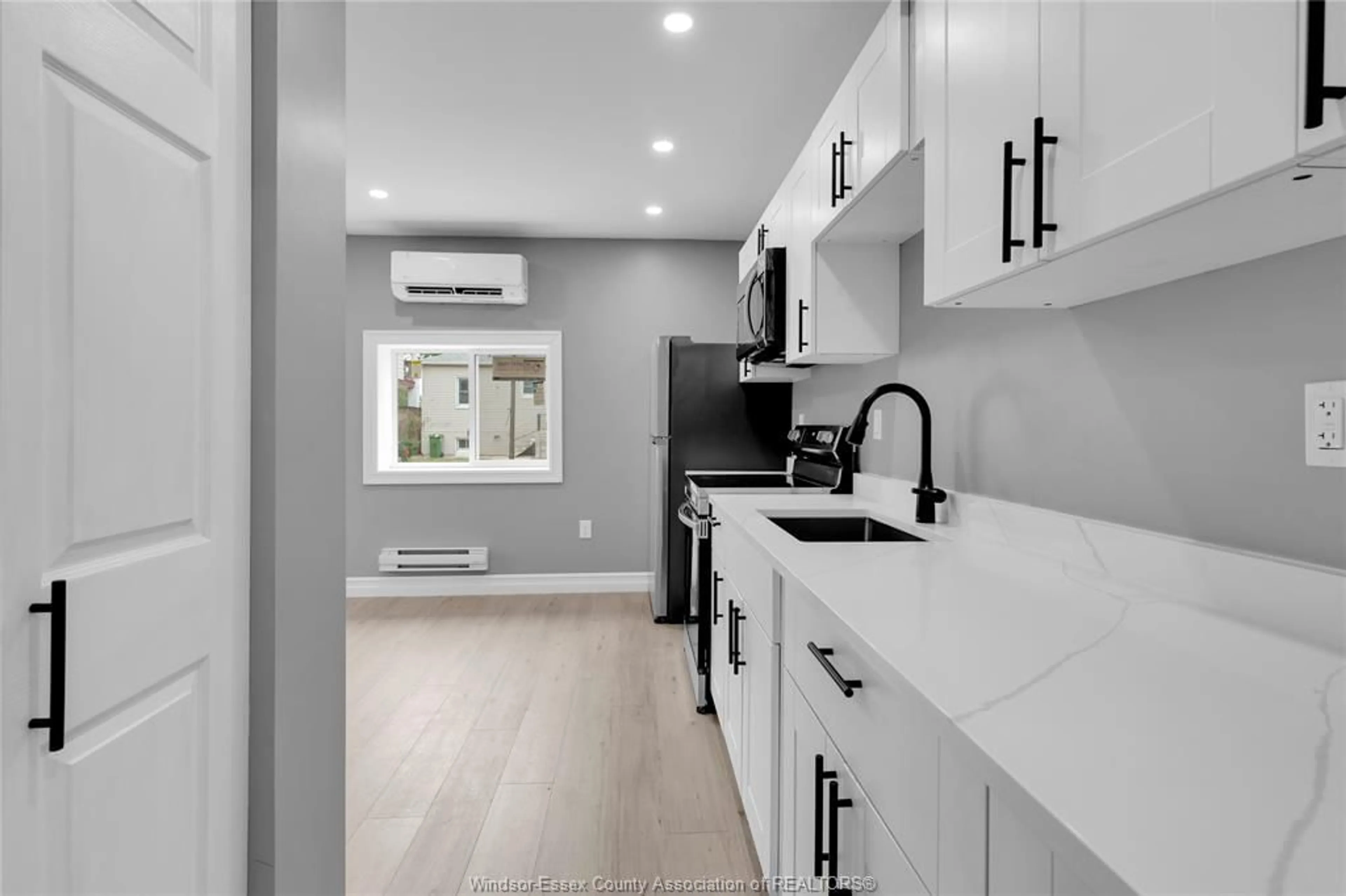 Open concept kitchen, ceramic/tile floor for 946 HOWARD Ave #1 & 2, Windsor Ontario N9A 1S5