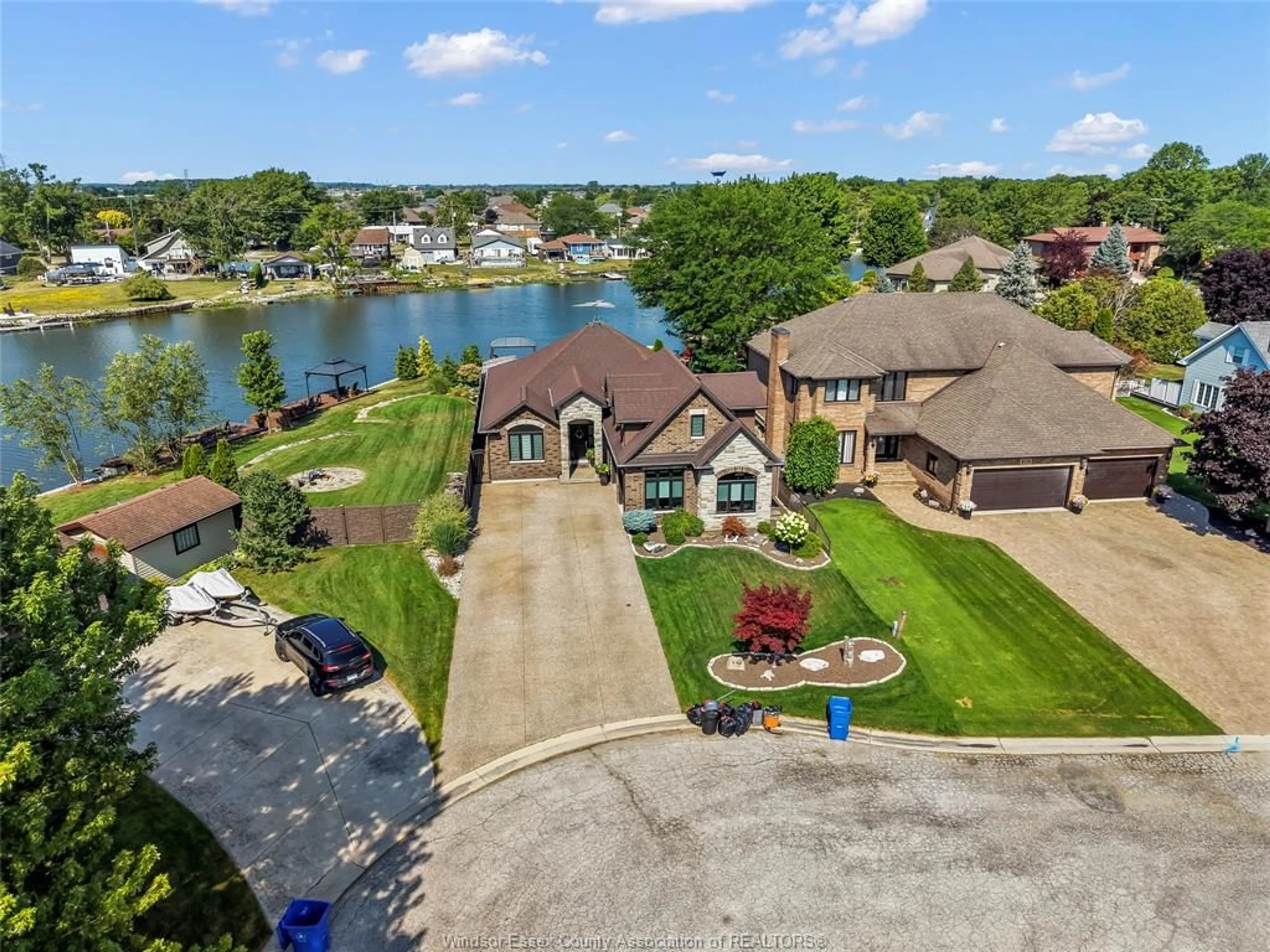 A pic from outside/outdoor area/front of a property/back of a property/a pic from drone, water/lake/river/ocean view for 536 RIVIERA ESTATE Dr, Belle River Ontario N8L 0L4