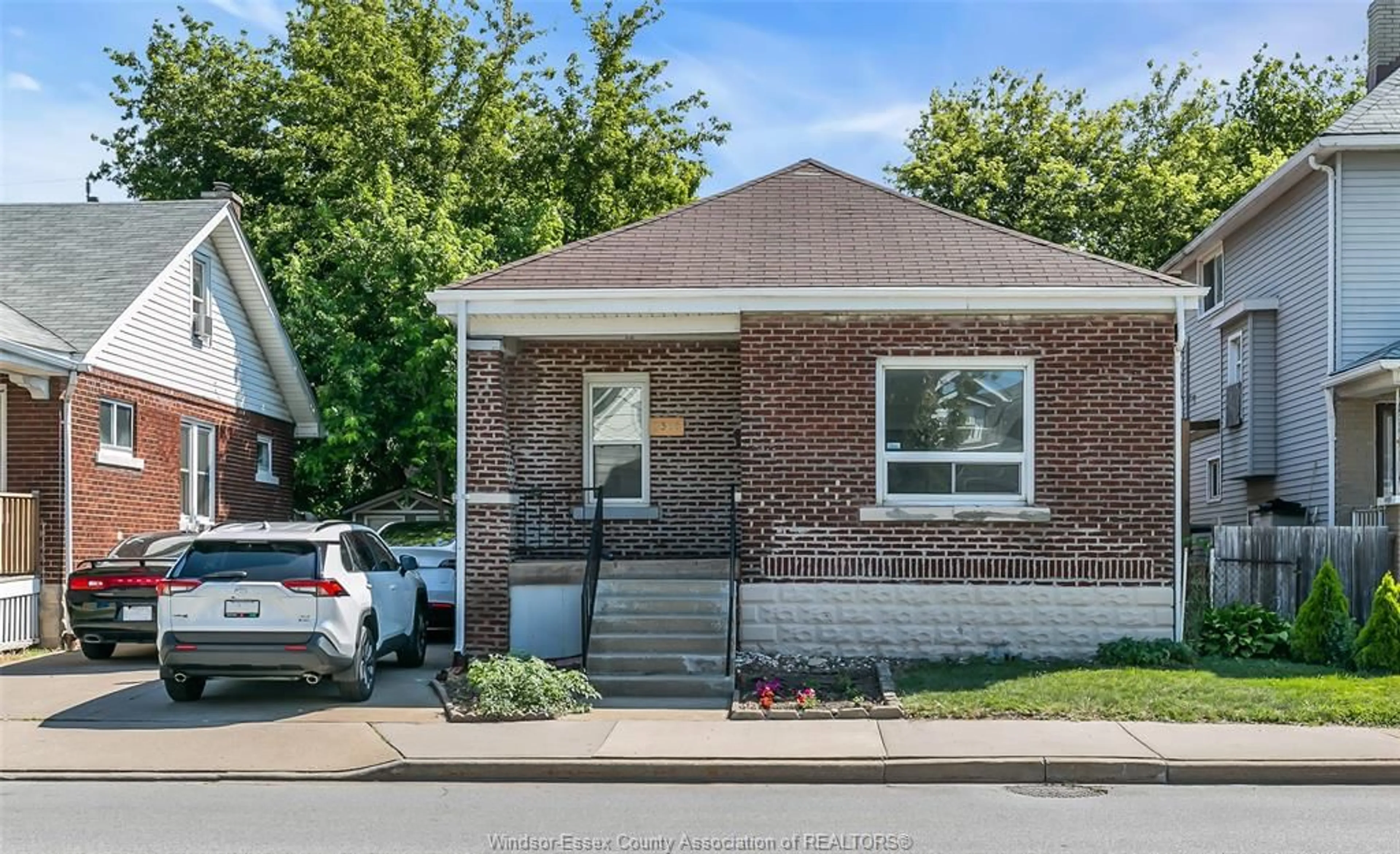 Home with brick exterior material, street for 2366 HOWARD, Windsor Ontario N8X 3V3