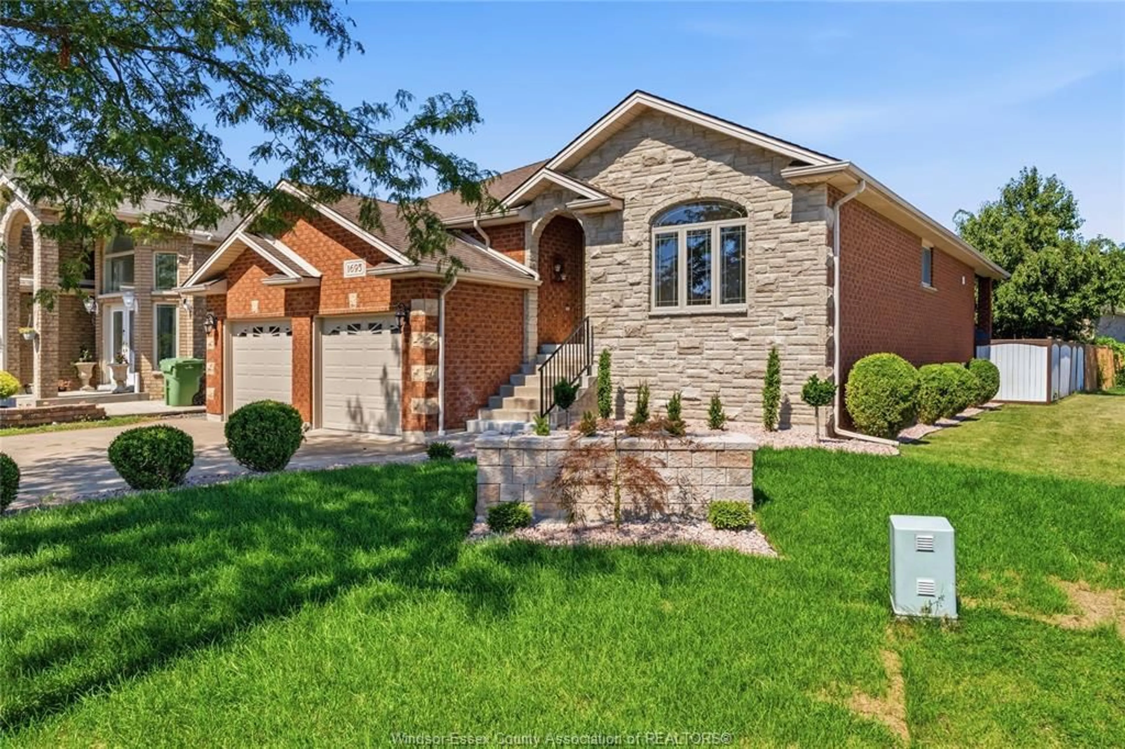 Home with brick exterior material, street for 1695 MERIDIAN St, Windsor Ontario N9G 3E7