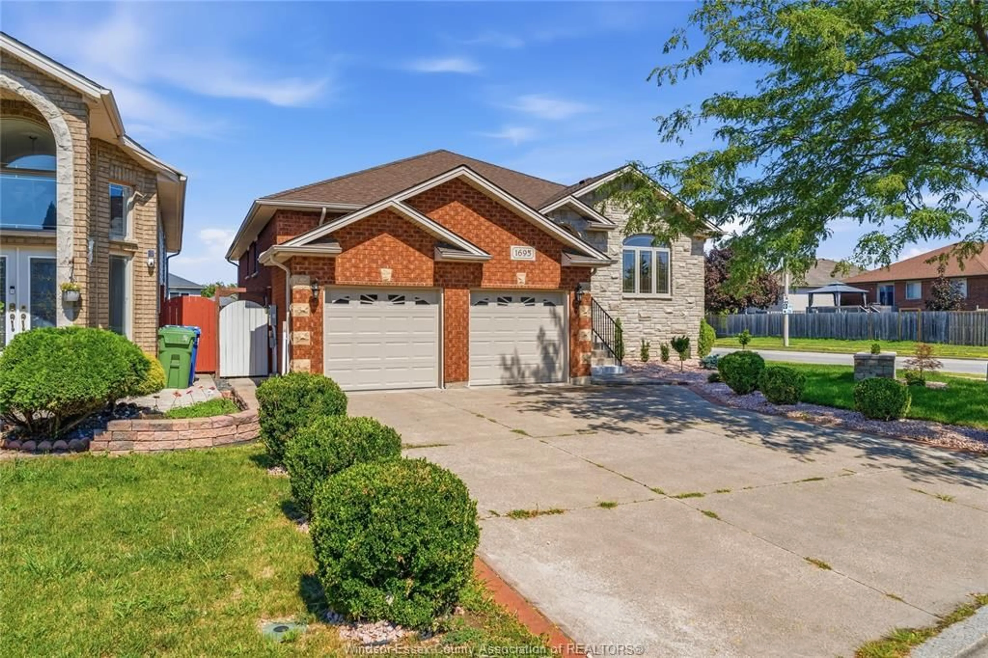 Home with brick exterior material, street for 1695 MERIDIAN St, Windsor Ontario N9G 3E7