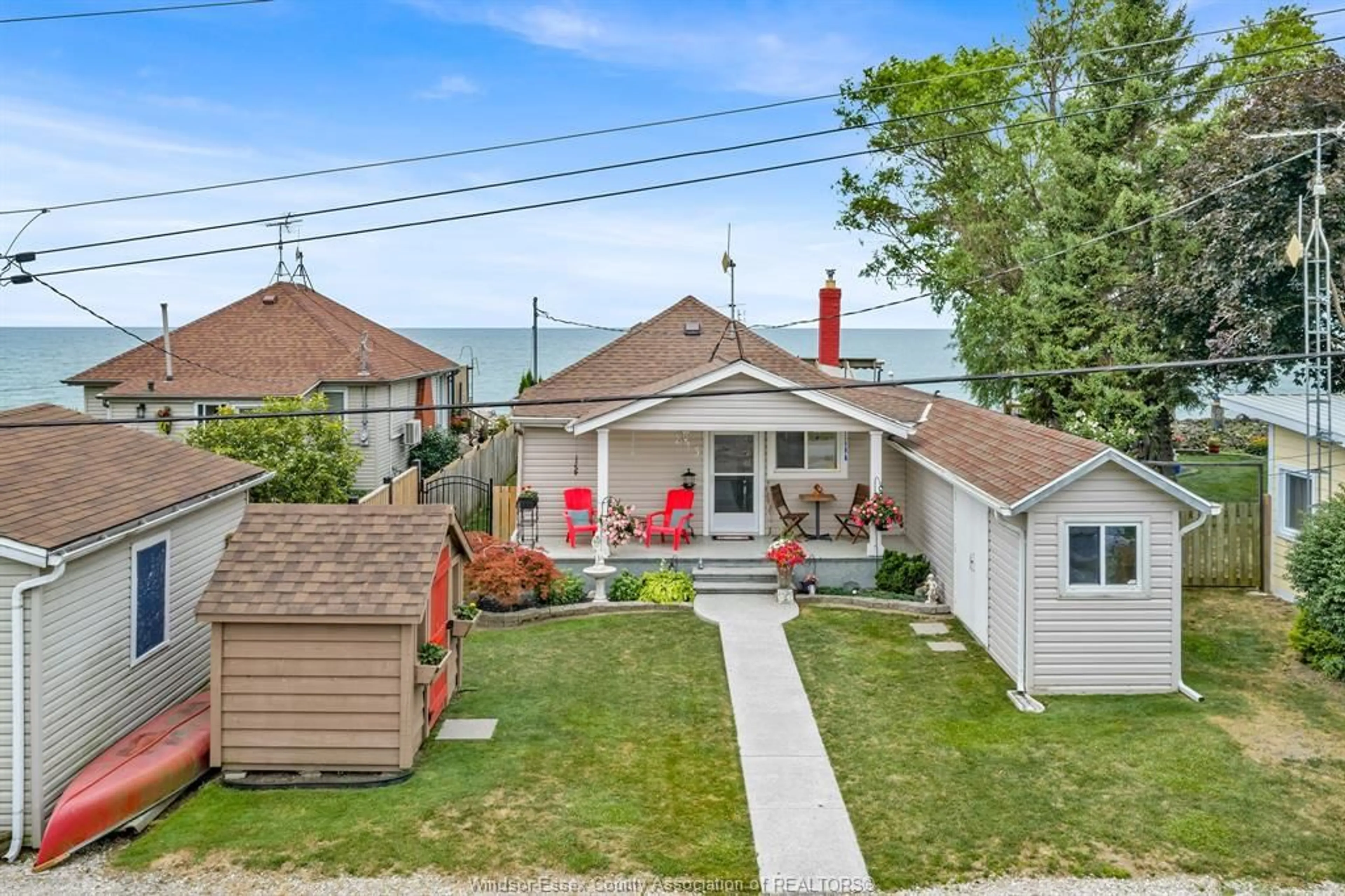 A pic from outside/outdoor area/front of a property/back of a property/a pic from drone, street for 813 Erie Shores Dr., Colchester Ontario N0R 1G0