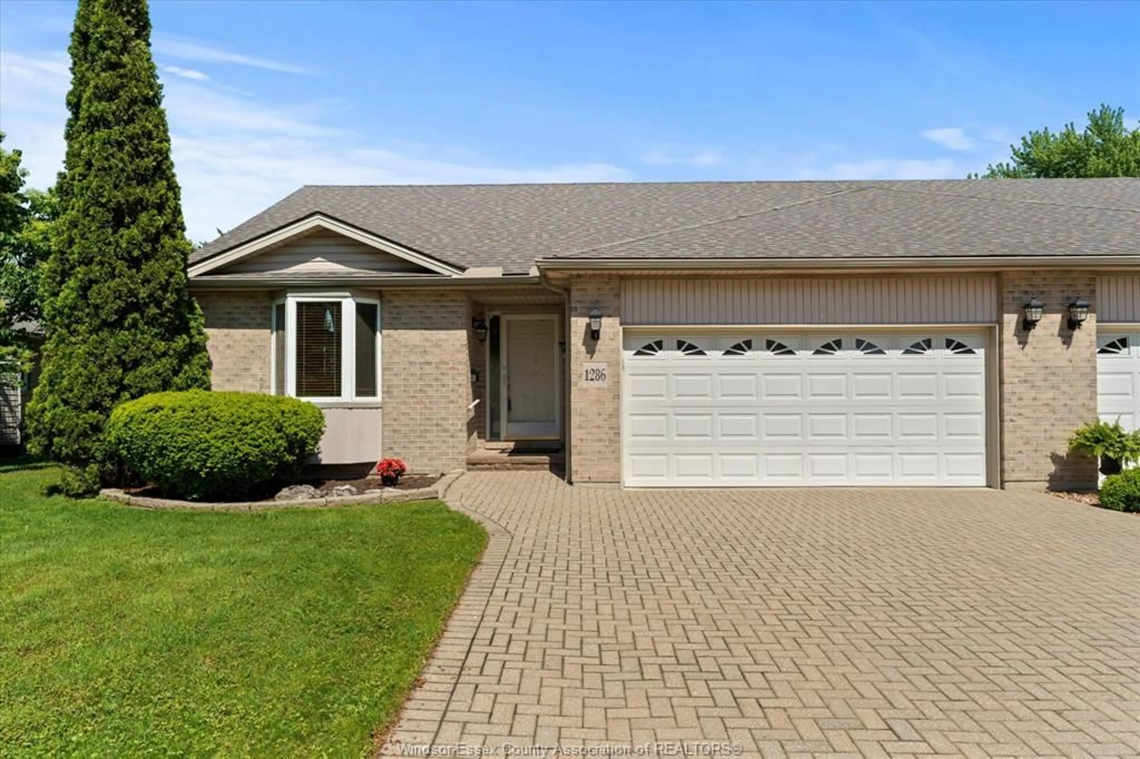 Home with vinyl exterior material, street for 1286 Rendezvous, Windsor Ontario N8P 1K6