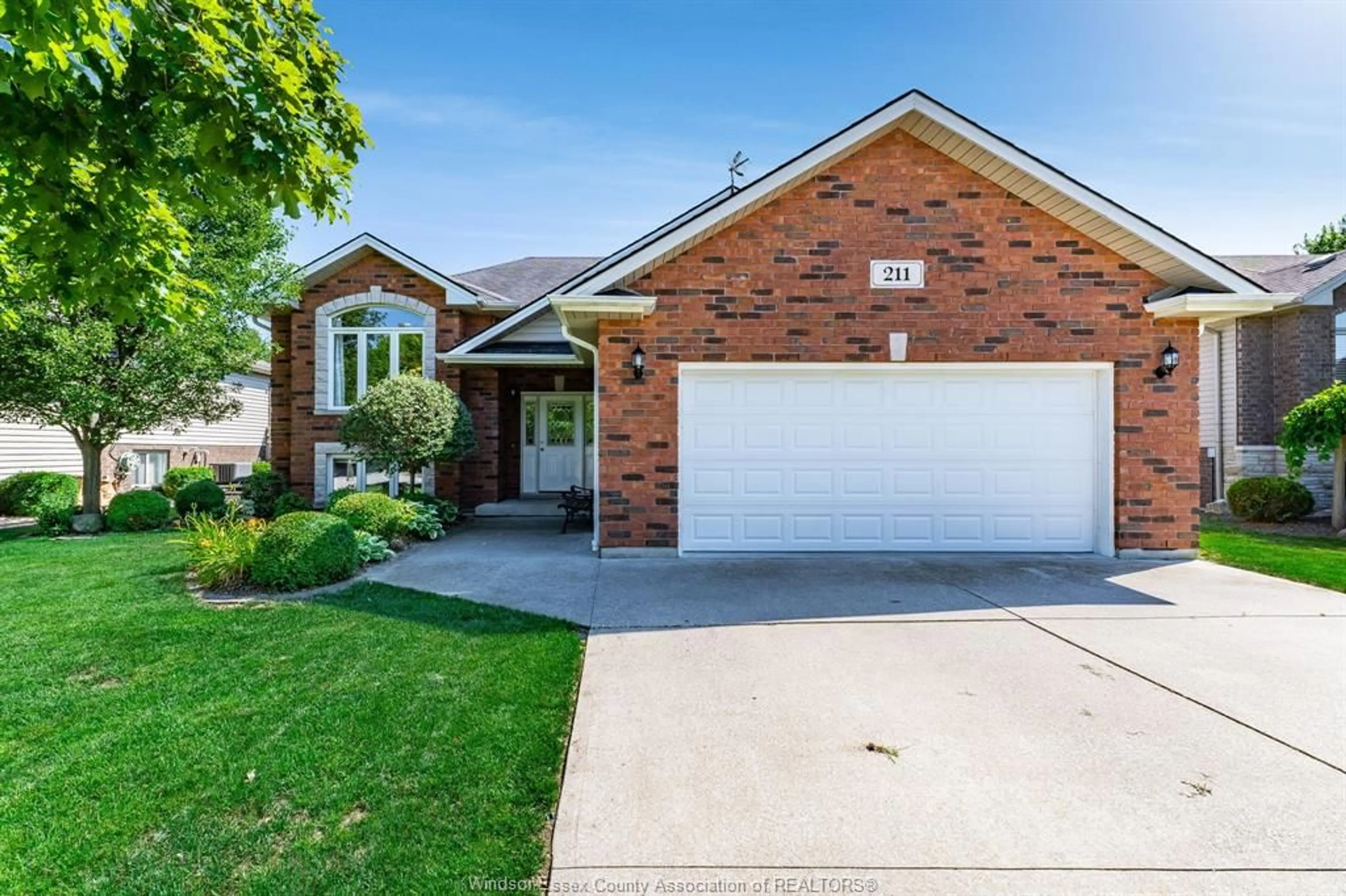 Home with brick exterior material, street for 211 Dieppe Cres, Kingsville Ontario N9Y 4B9