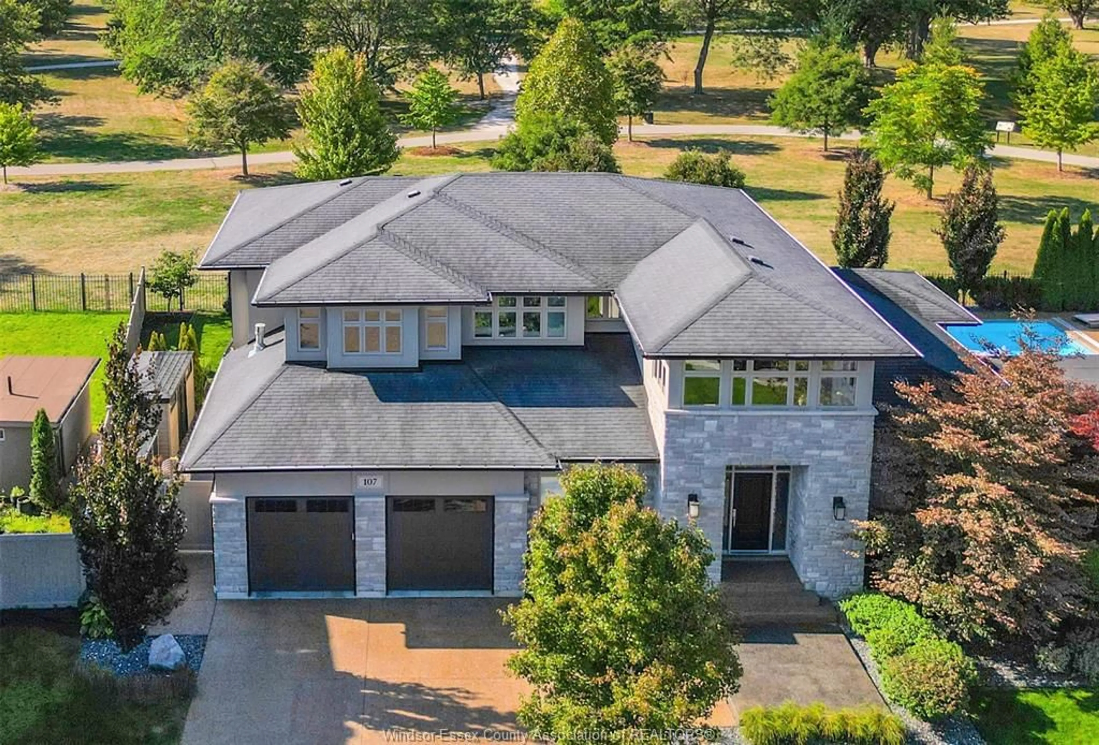 A pic from outside/outdoor area/front of a property/back of a property/a pic from drone, unknown for 107 CHRISTY Lane, Tecumseh Ontario N8N 4W4
