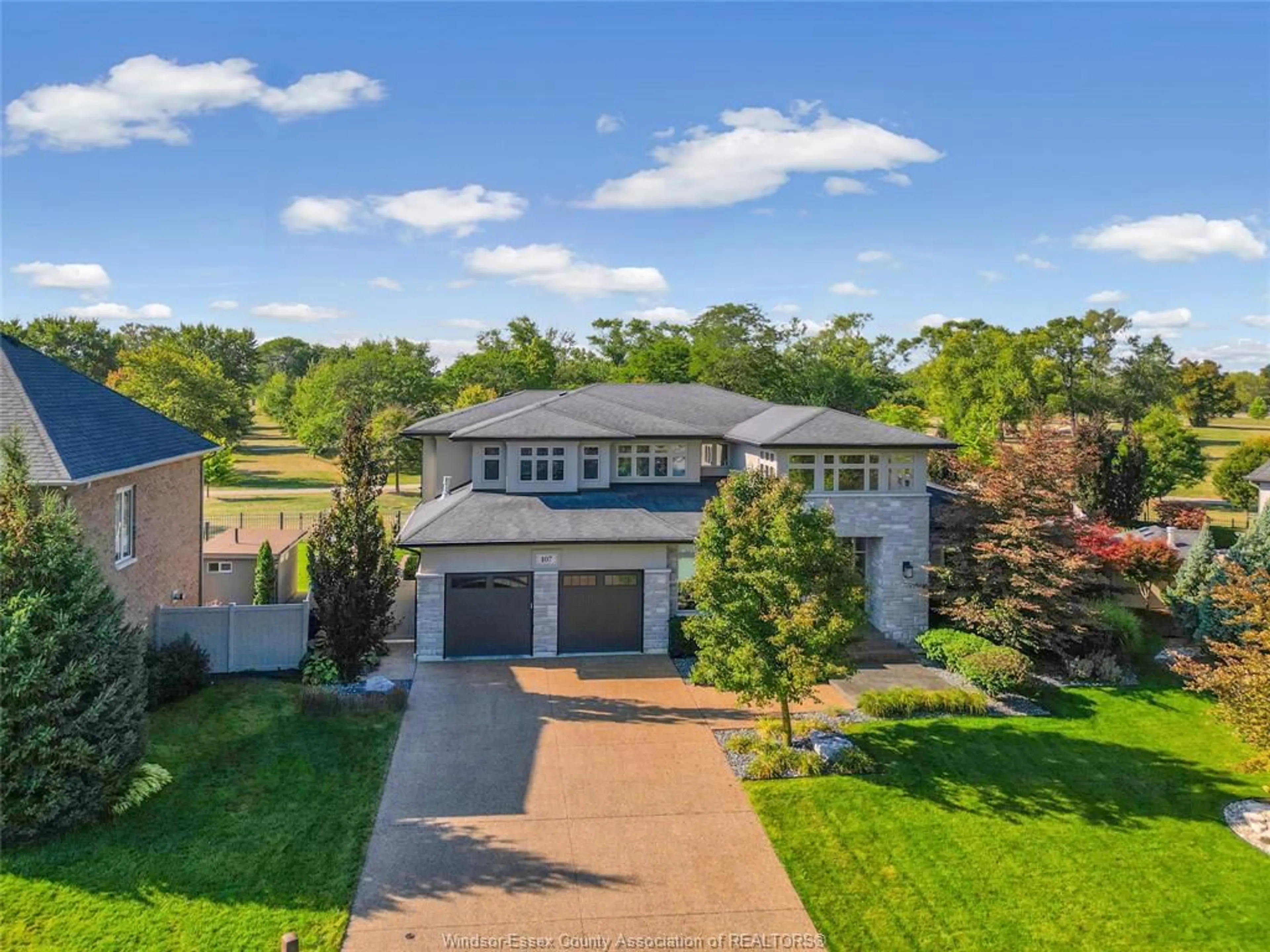 A pic from outside/outdoor area/front of a property/back of a property/a pic from drone, street for 107 CHRISTY Lane, Tecumseh Ontario N8N 4W4