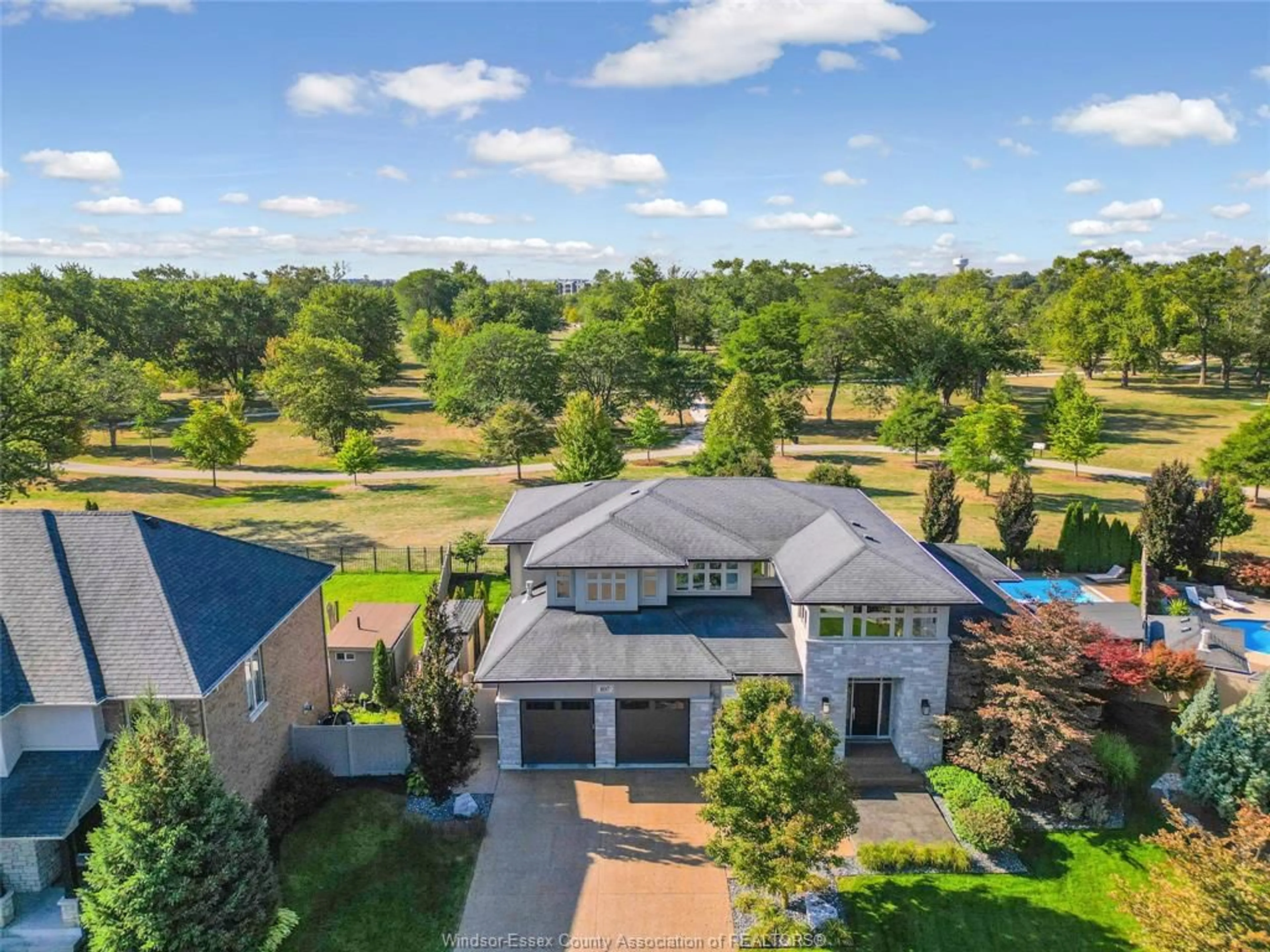 A pic from outside/outdoor area/front of a property/back of a property/a pic from drone, unknown for 107 CHRISTY Lane, Tecumseh Ontario N8N 4W4
