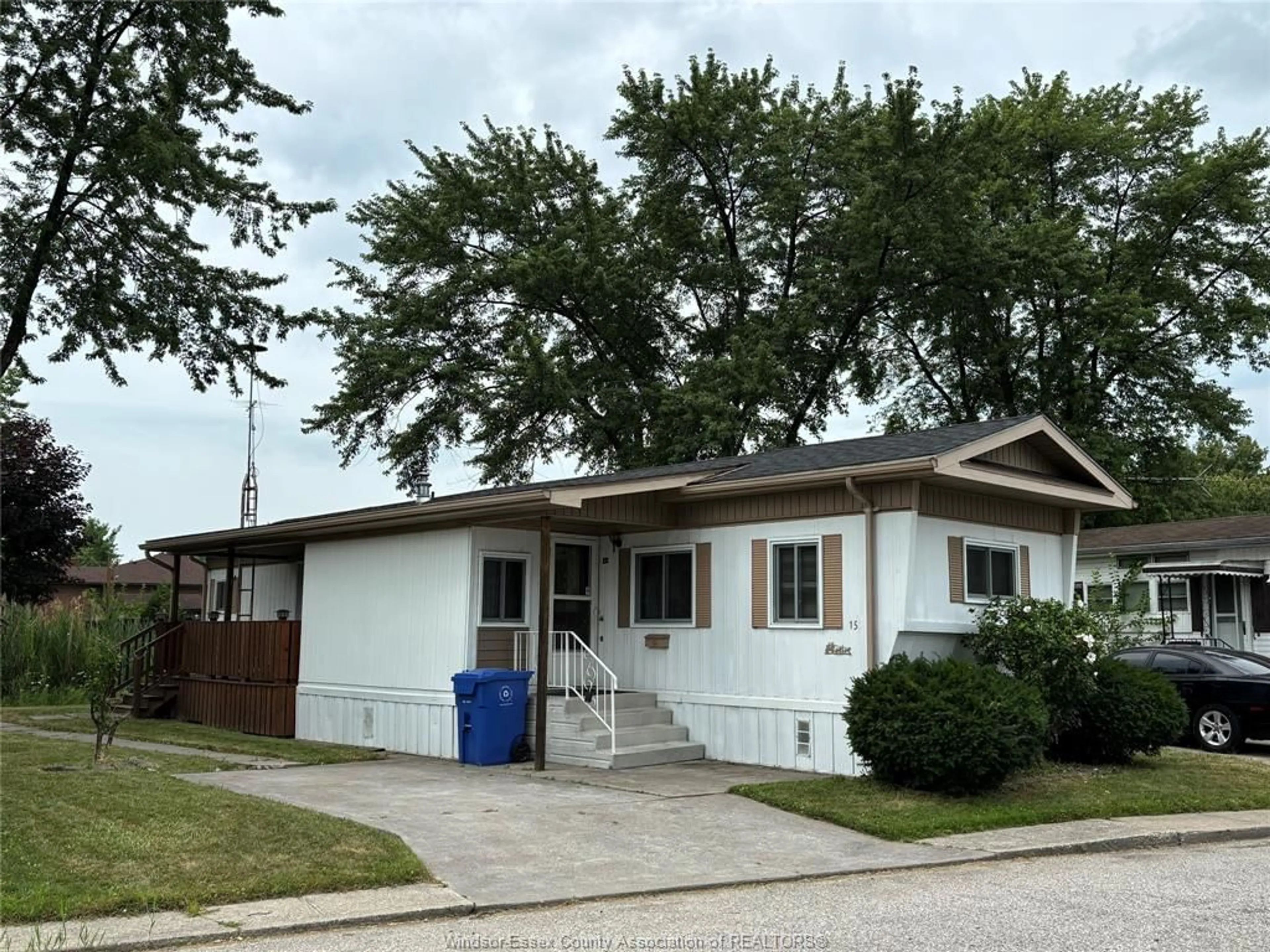 Home with vinyl exterior material, street for 15 WILDER, Lakeshore Ontario N8N 2T1