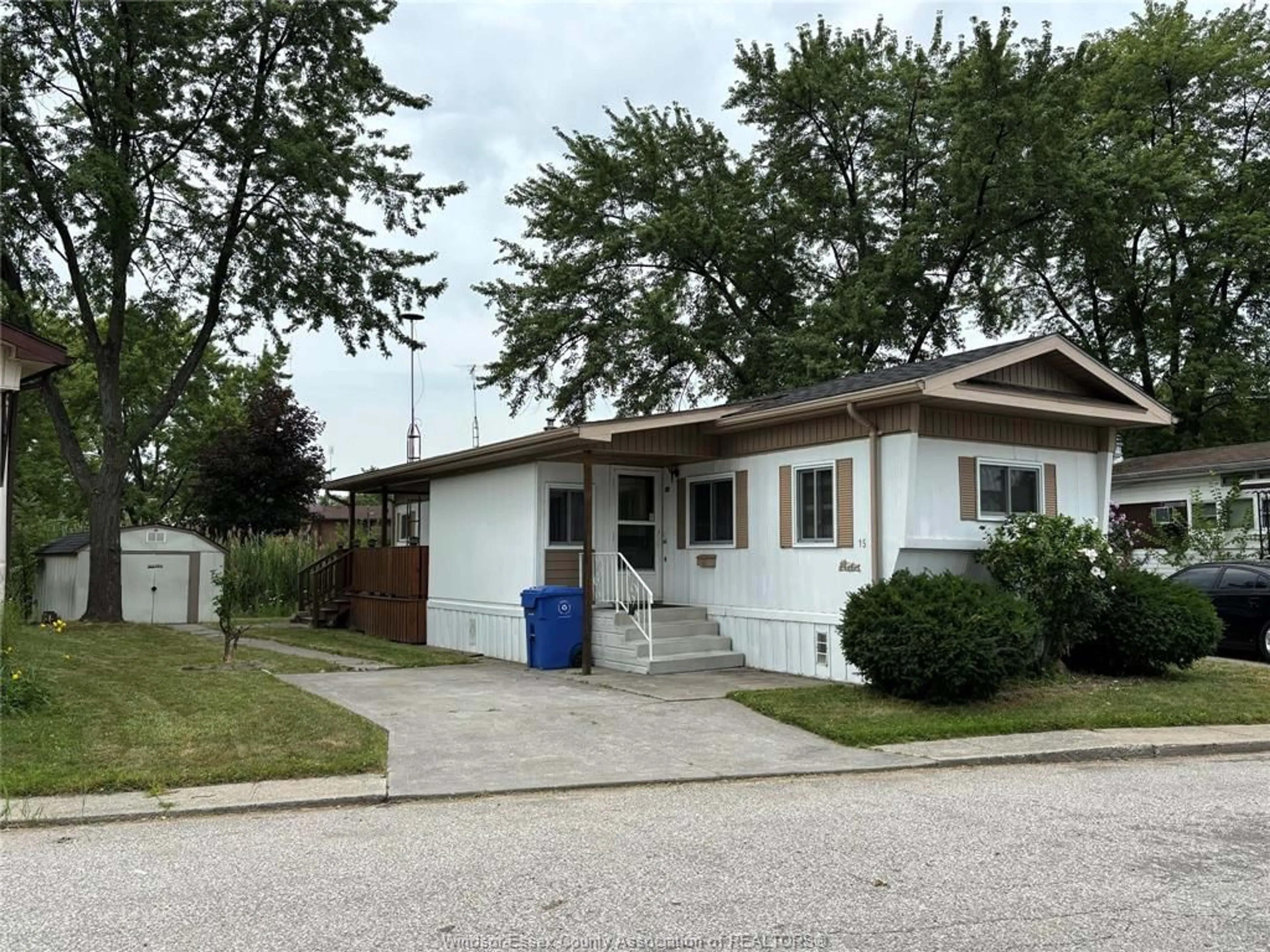 Home with vinyl exterior material, street for 15 WILDER, Lakeshore Ontario N8N 2T1