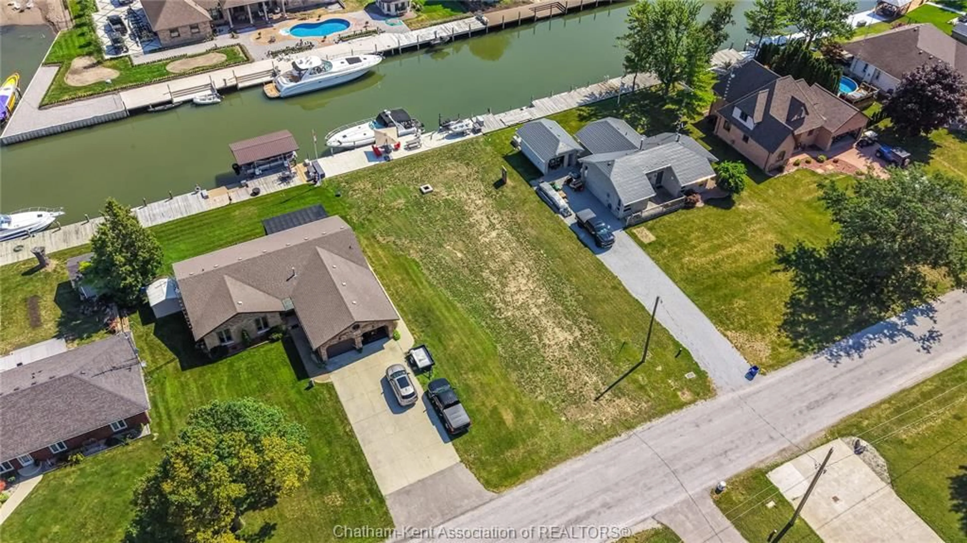 A pic from outside/outdoor area/front of a property/back of a property/a pic from drone, water/lake/river/ocean view for 19030 LIGHT COVE Ave, Lighthouse Cove Ontario N0P 2L0