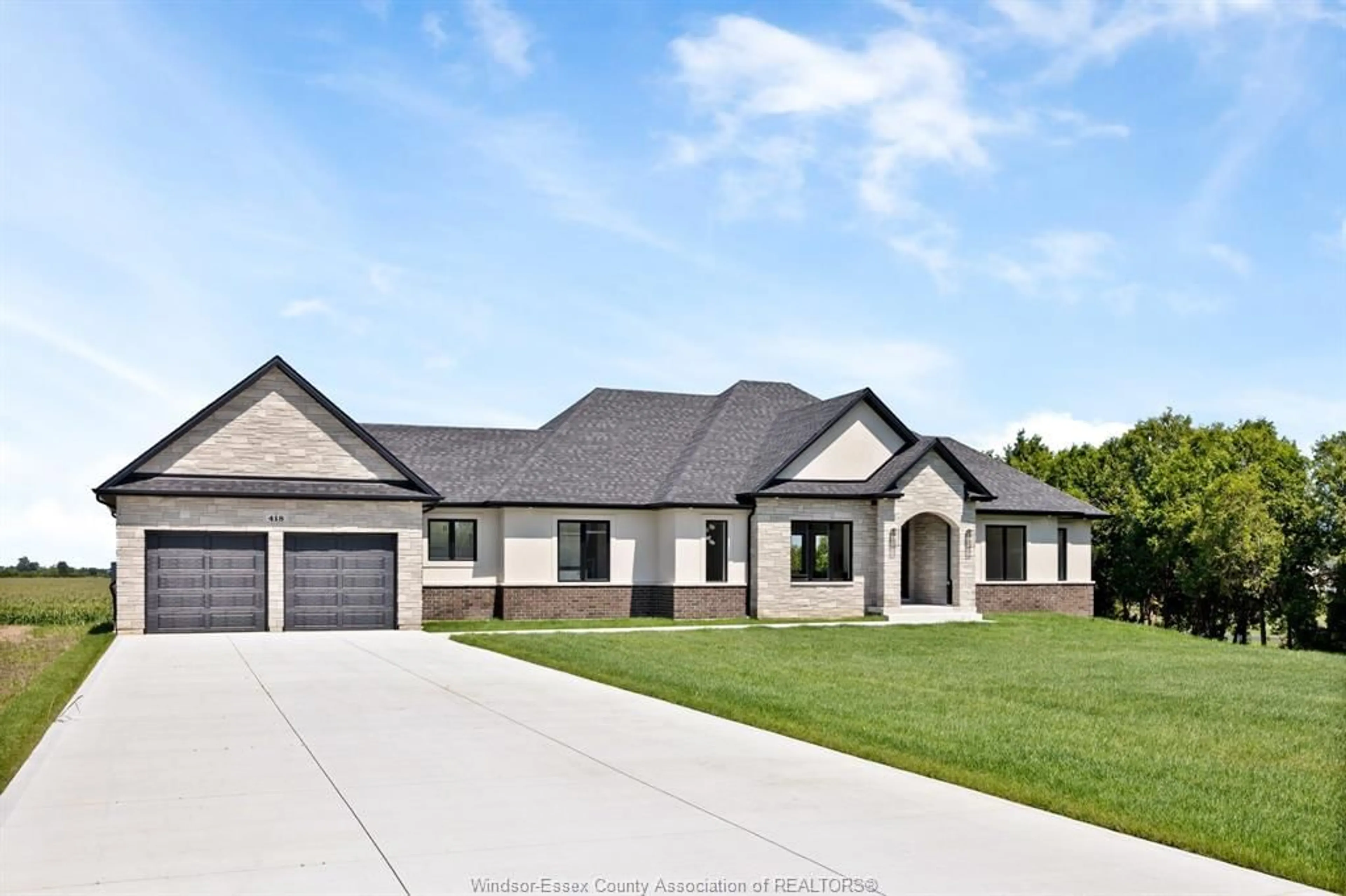 Home with brick exterior material, street for 418 COUNTY RD 34, Kingsville Ontario N8H 3V6
