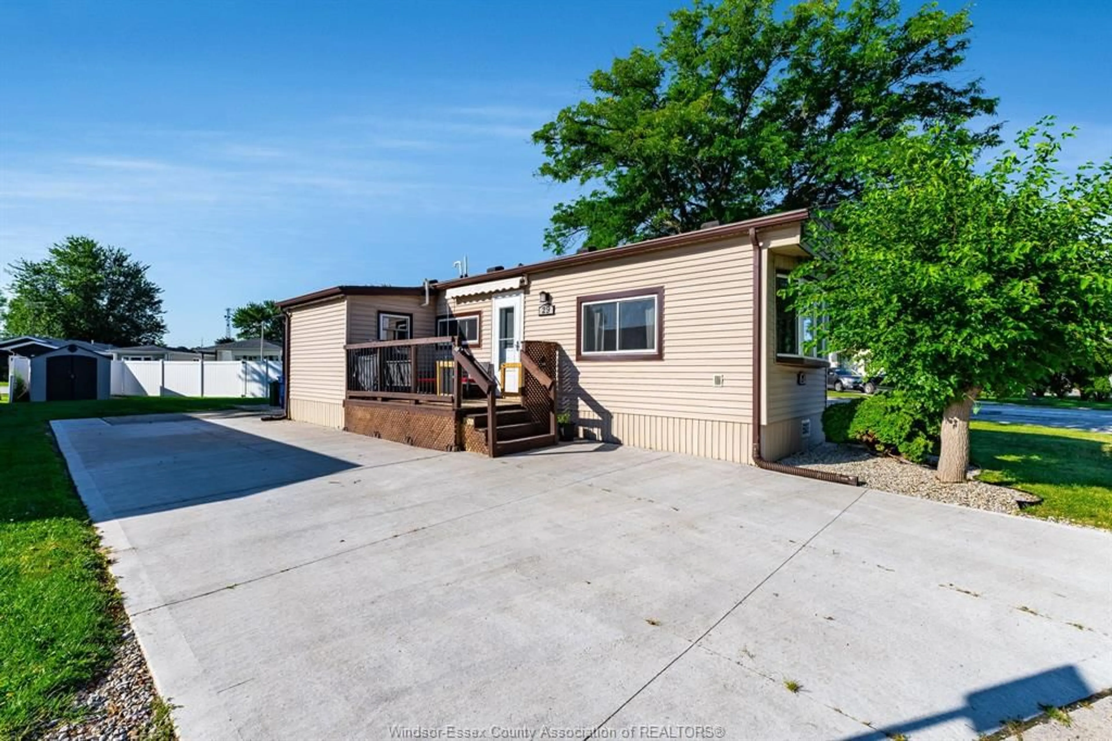 A pic from outside/outdoor area/front of a property/back of a property/a pic from drone, water/lake/river/ocean view for 29 Parkside Dr, McGregor Ontario N0R 1J0