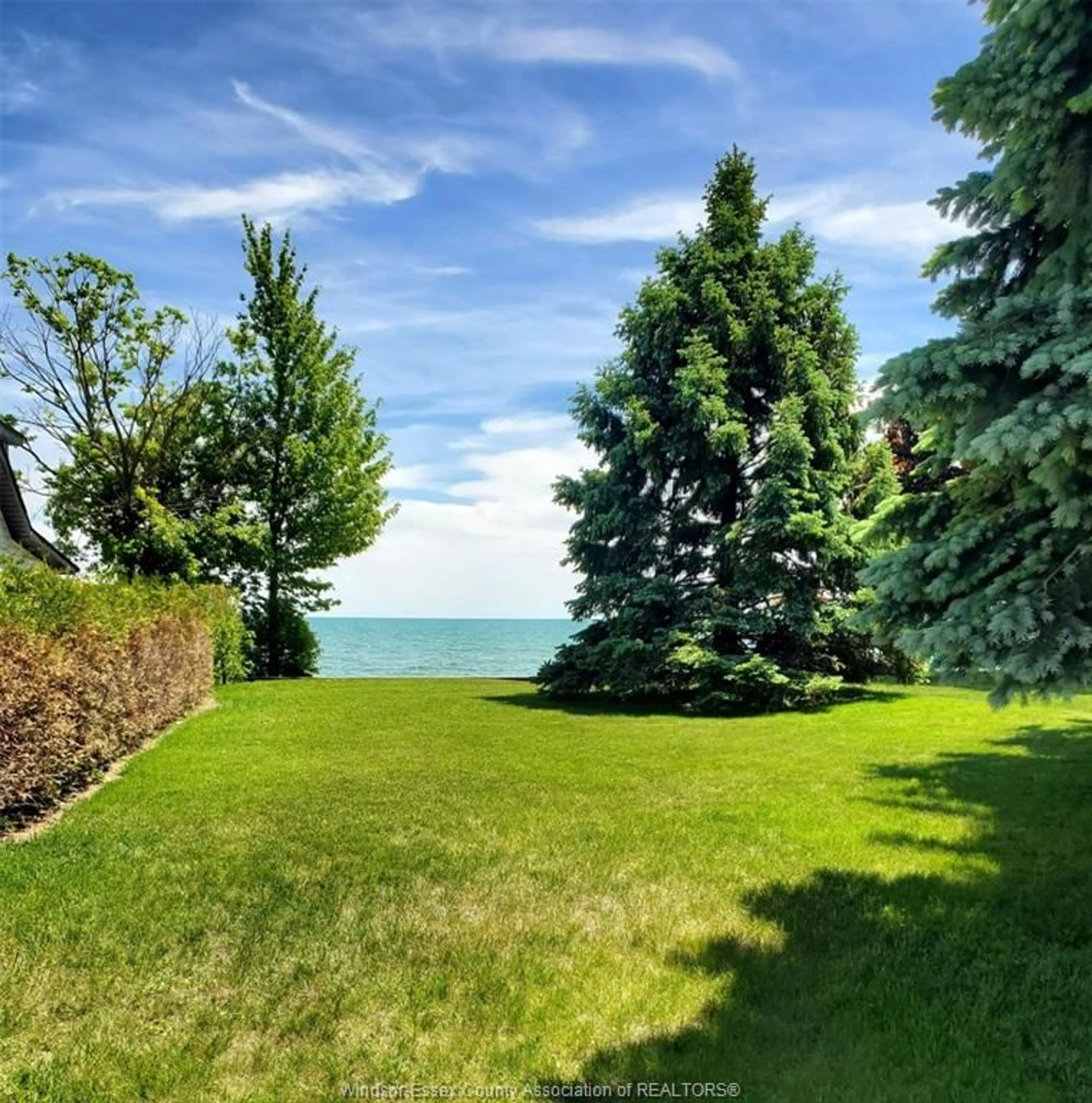 A pic from outside/outdoor area/front of a property/back of a property/a pic from drone, water/lake/river/ocean view for 1351 Heritage Rd, Kingsville Ontario N8H 4C9
