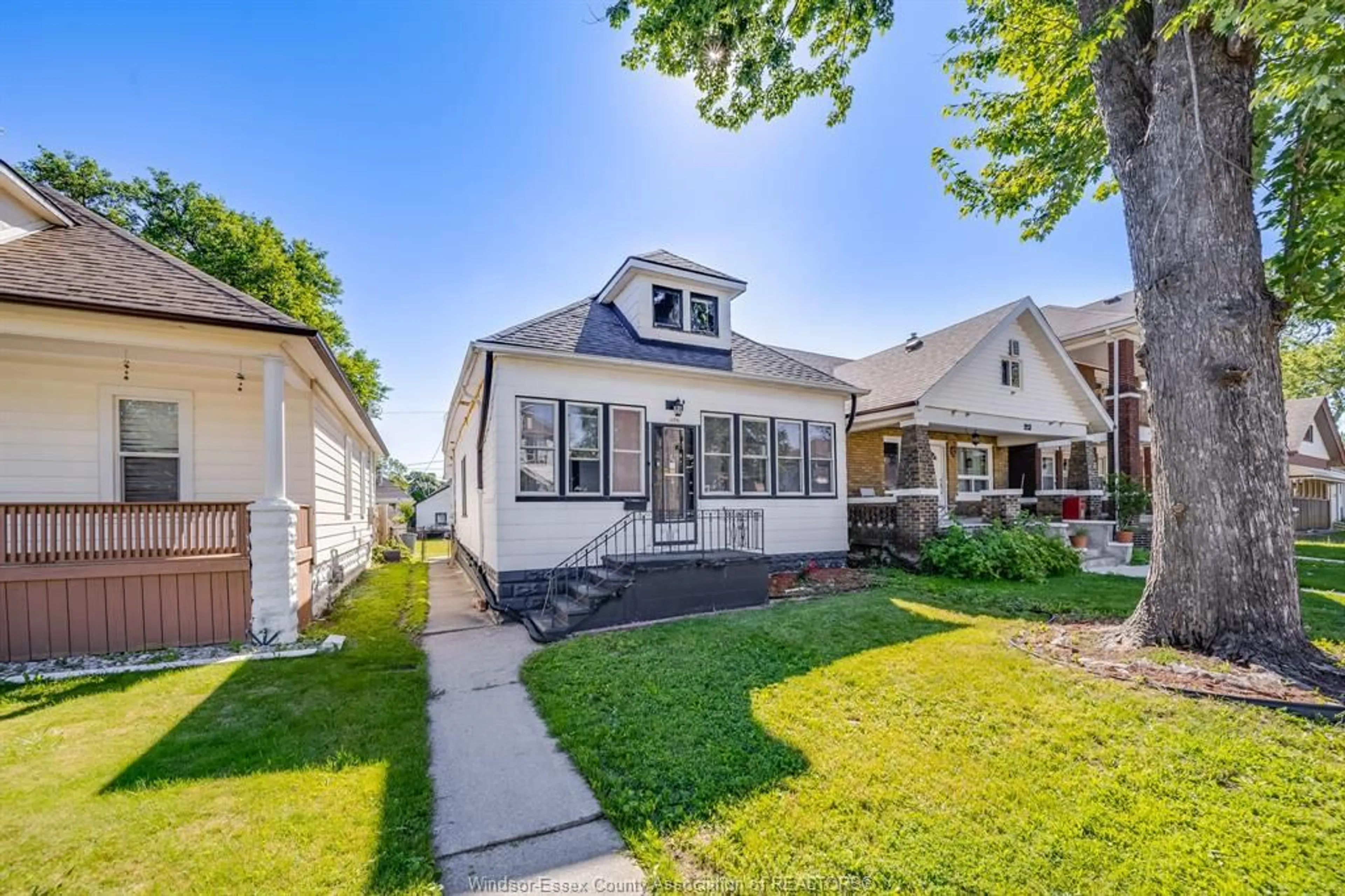 Home with vinyl exterior material, street for 1170 PIERRE Ave, Windsor Ontario N9A 2L4