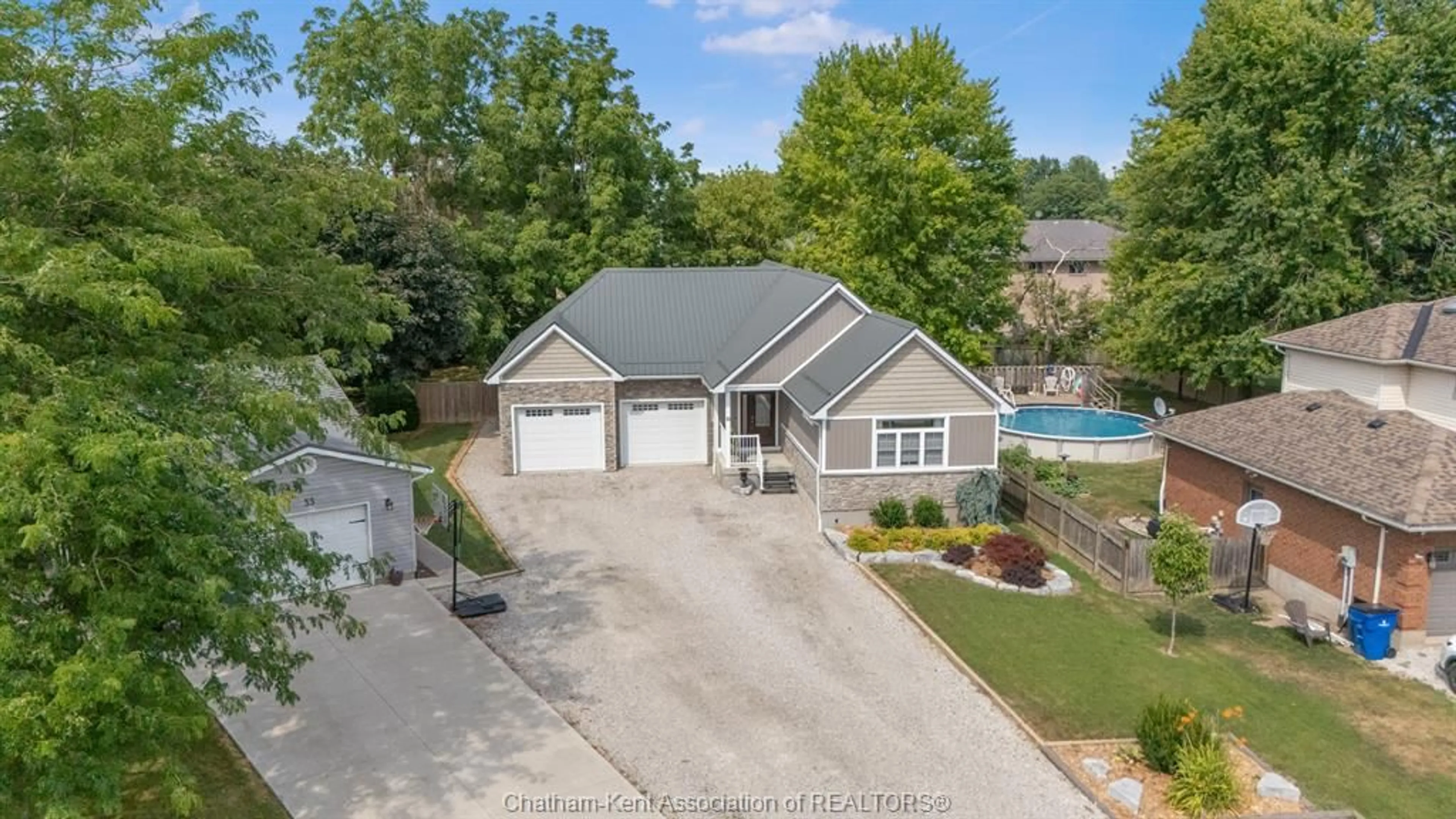 A pic from outside/outdoor area/front of a property/back of a property/a pic from drone, water/lake/river/ocean view for 31 Hidden Valley Dr, Blenheim Ontario N0P 1A0