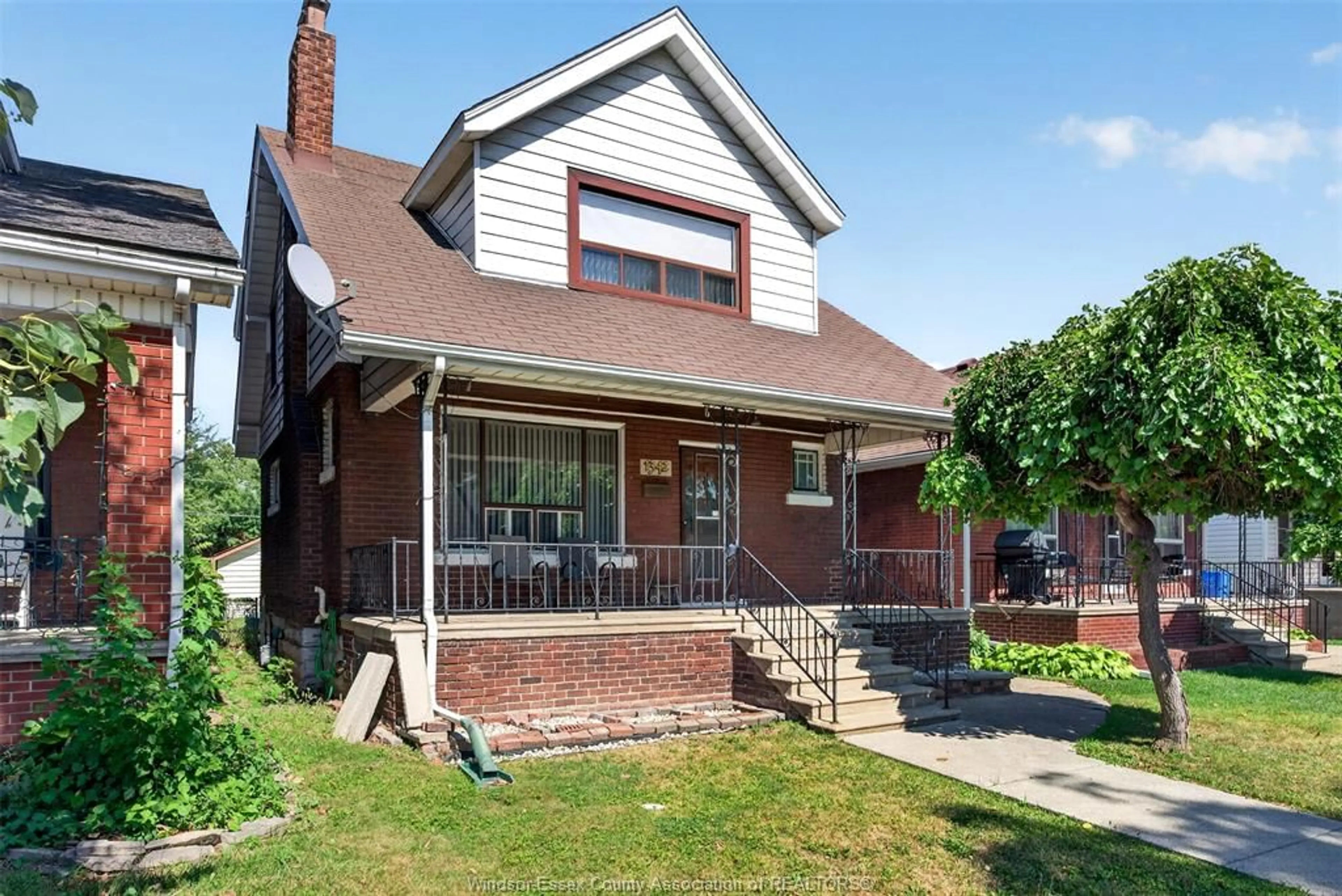 Home with brick exterior material, street for 1342 Hall Ave, Windsor Ontario N8X 4R3