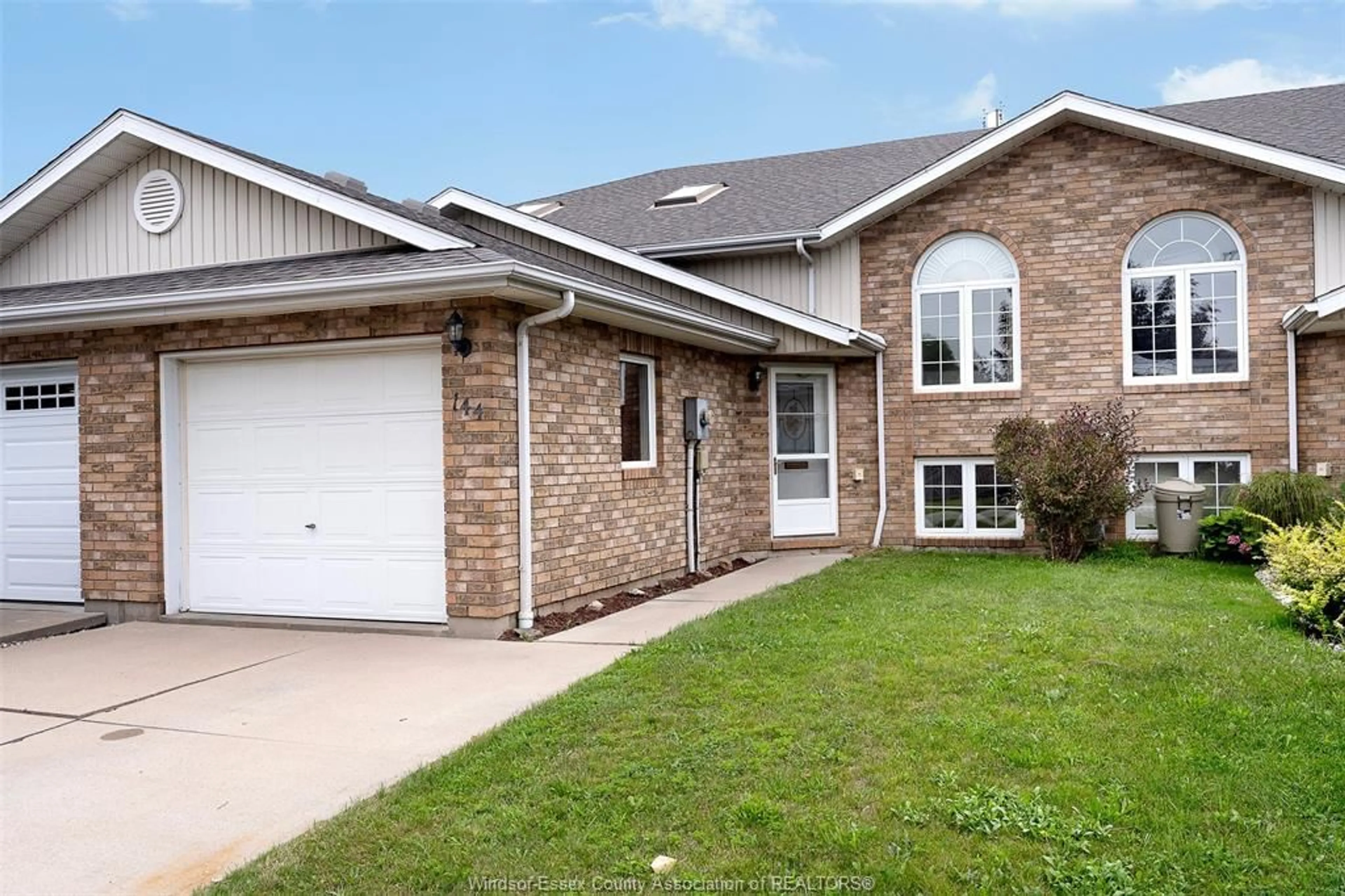 Home with brick exterior material, street for 144 Bennie Ave, Leamington Ontario N8H 4Y5