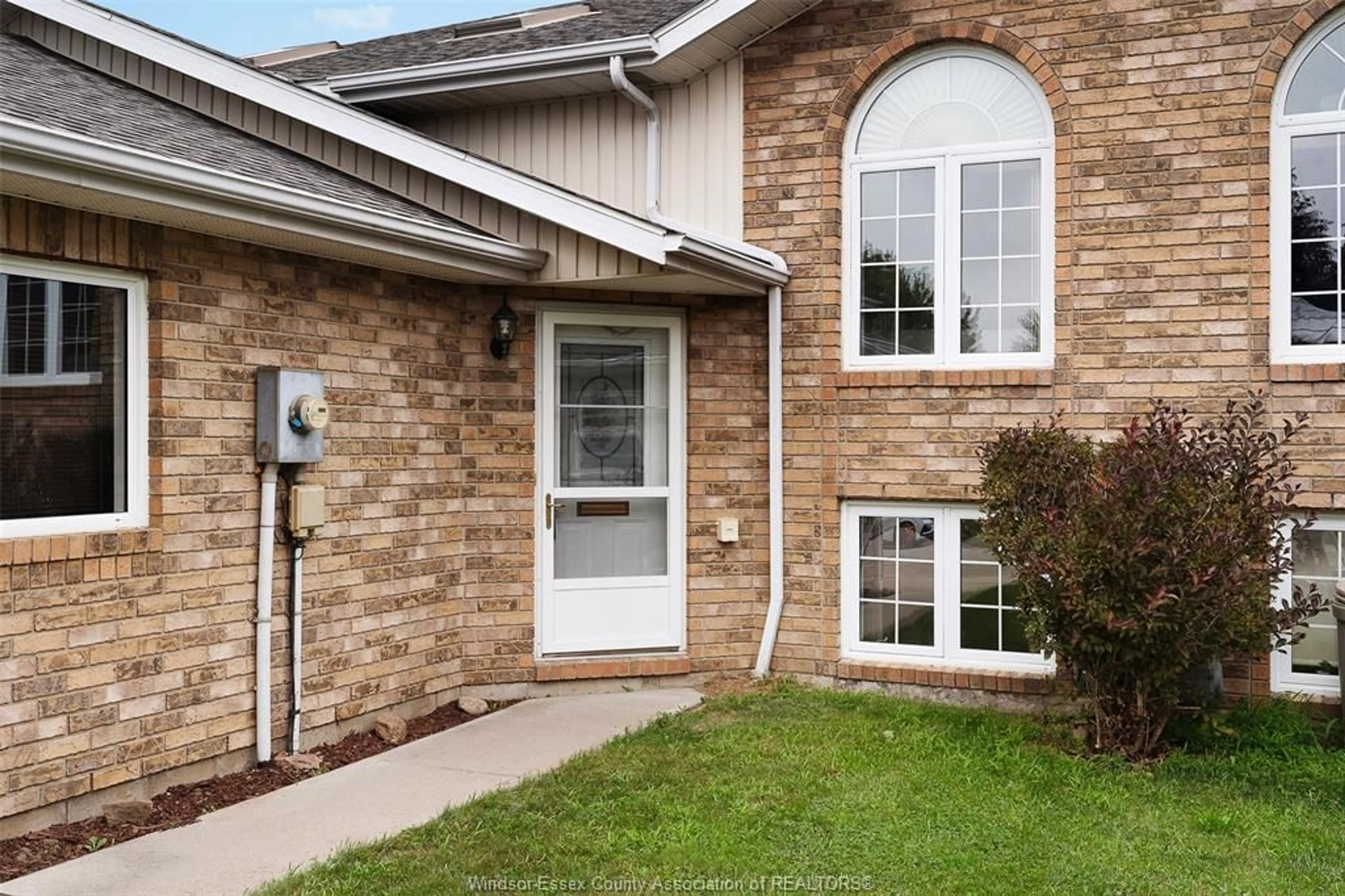 Home with brick exterior material, street for 144 Bennie Ave, Leamington Ontario N8H 4Y5