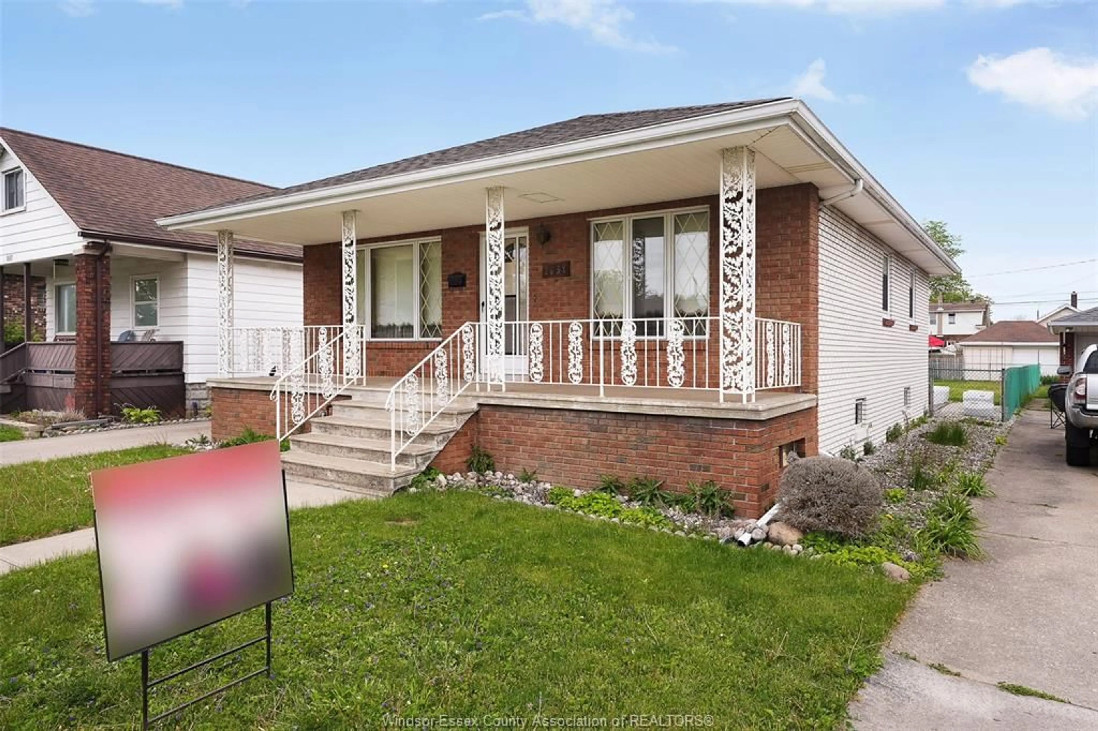 Home with brick exterior material, street for 1639 LANGLOIS Ave, Windsor Ontario N8X 4M4
