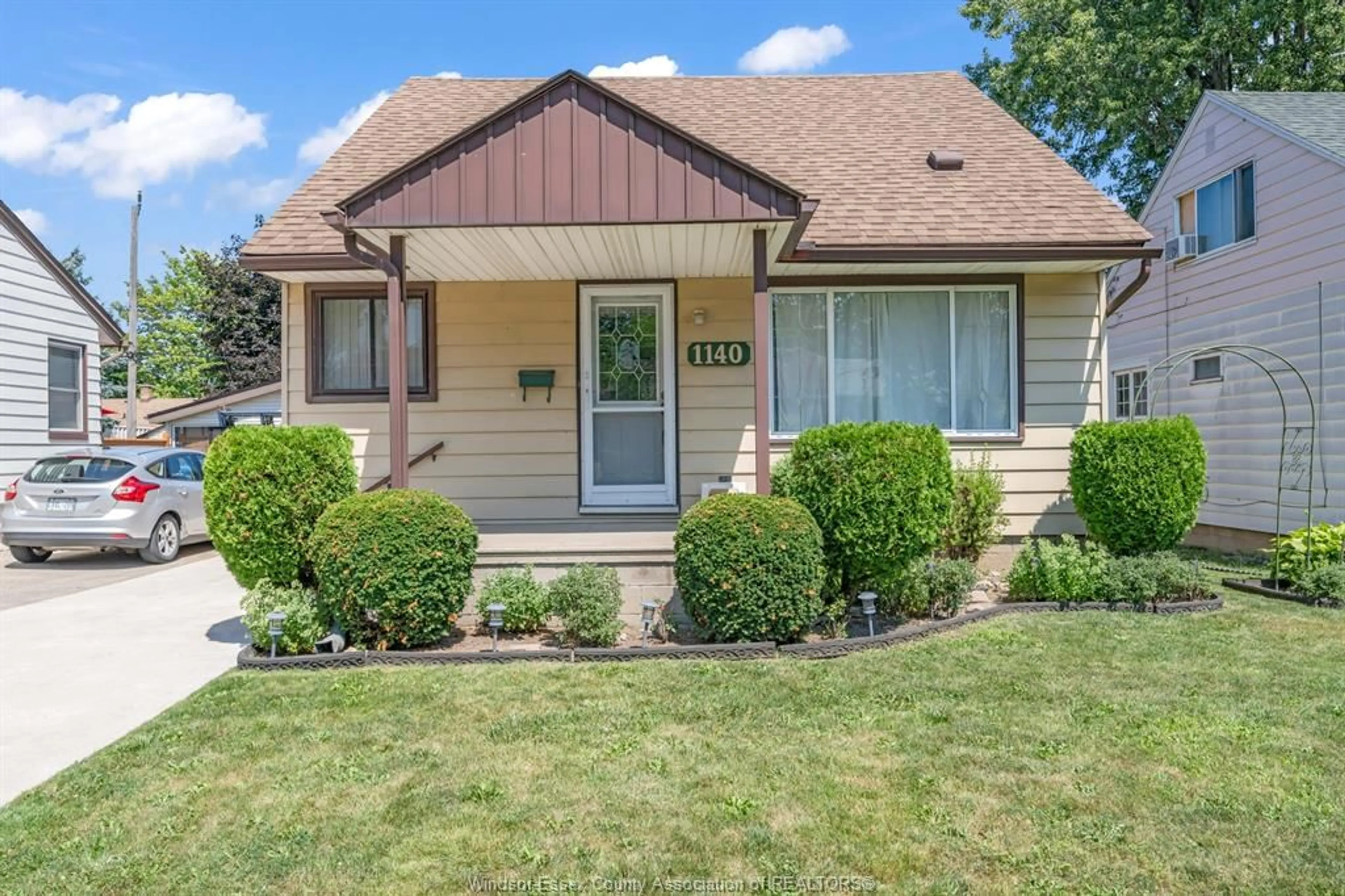 Home with vinyl exterior material, street for 1140 LENA, Windsor Ontario N9C 3K6