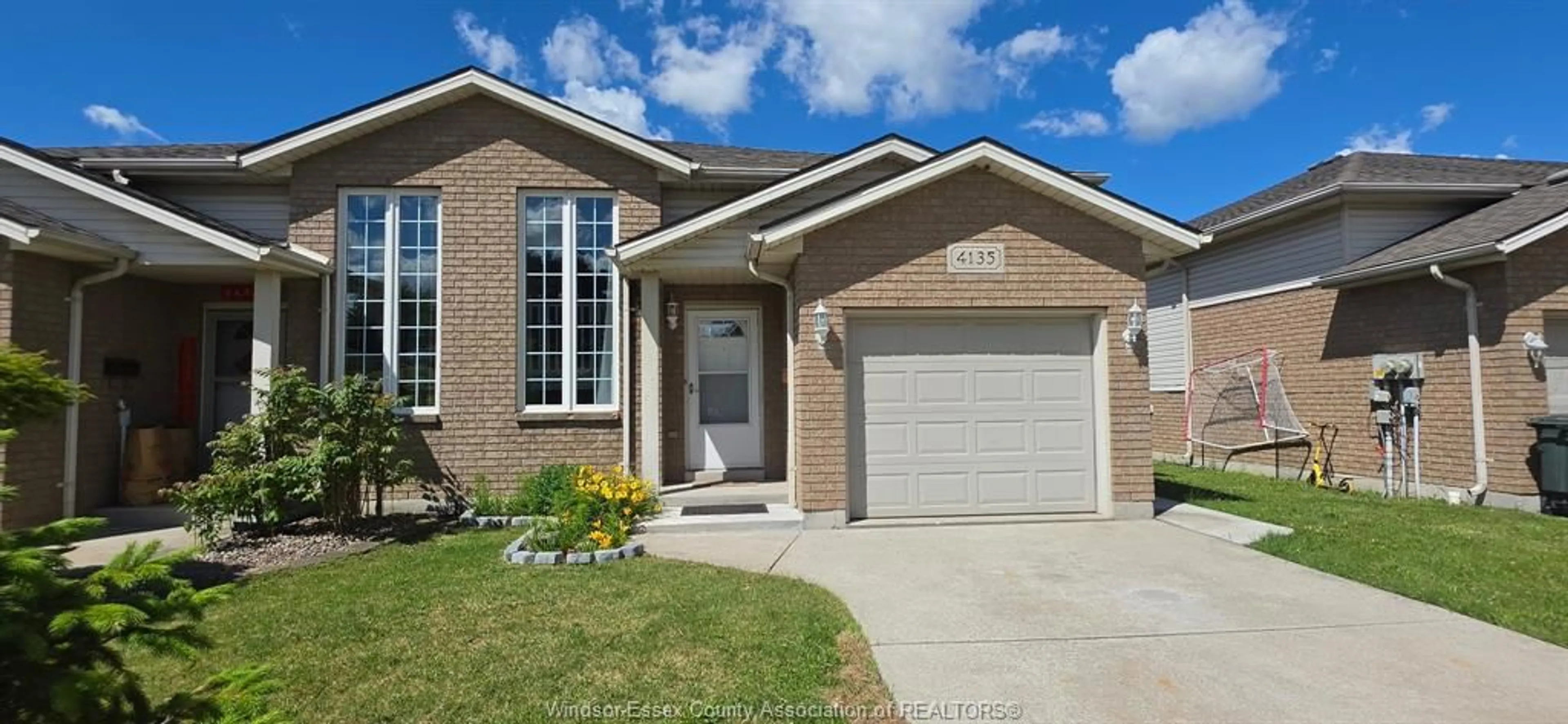 Home with brick exterior material, street for 4135 St. Clair, LaSalle Ontario N9H 2N5