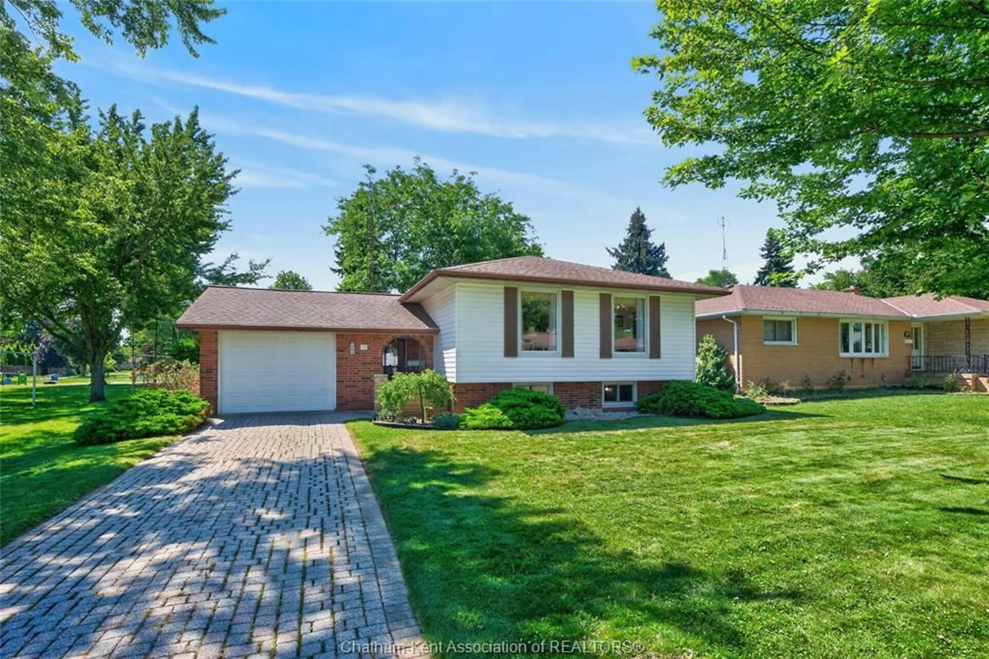 Home with brick exterior material, street for 18 CAMEO Dr, Leamington Ontario N8H 1J2