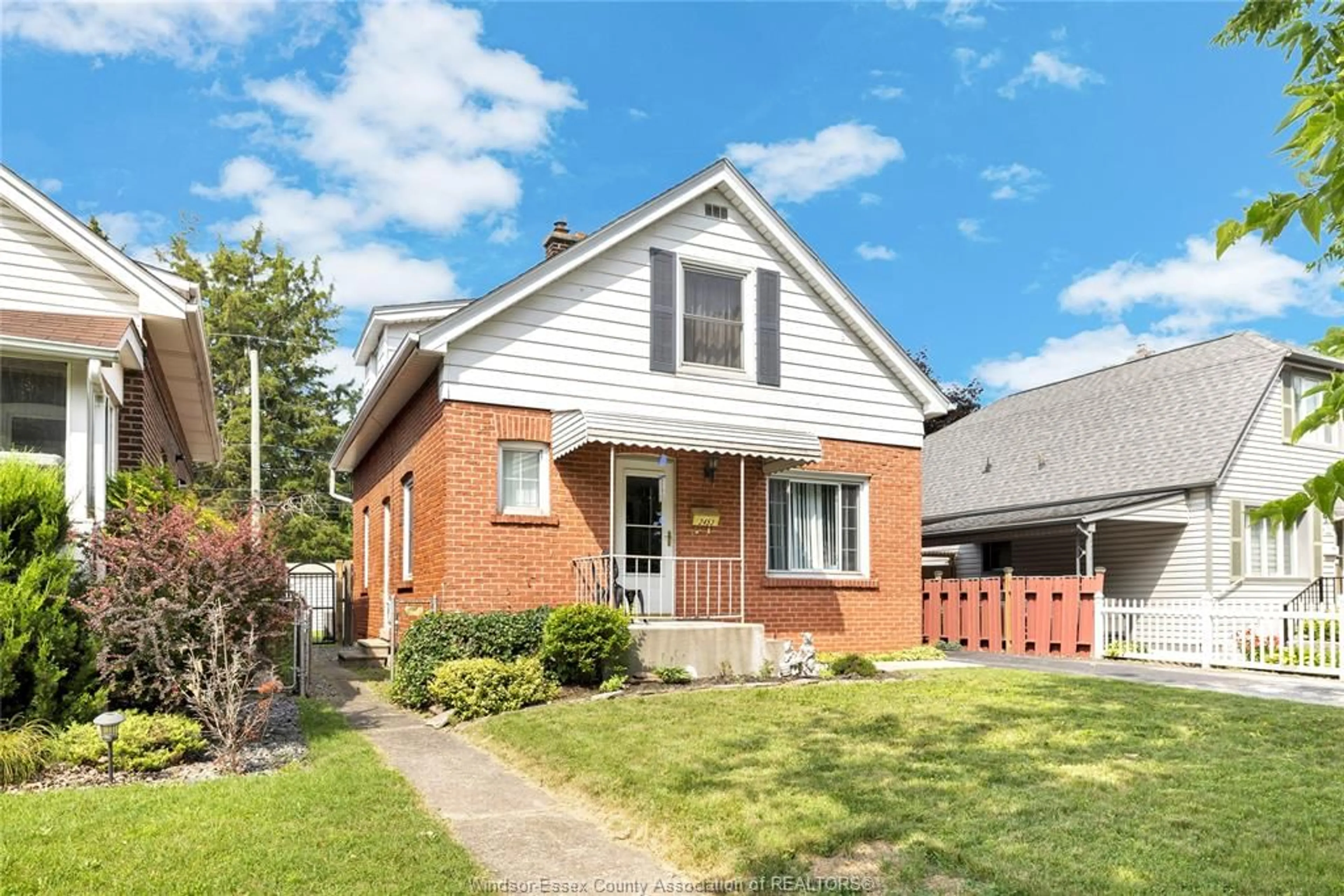 Home with brick exterior material, street for 2453 TURNER Rd, Windsor Ontario N8W 3K9