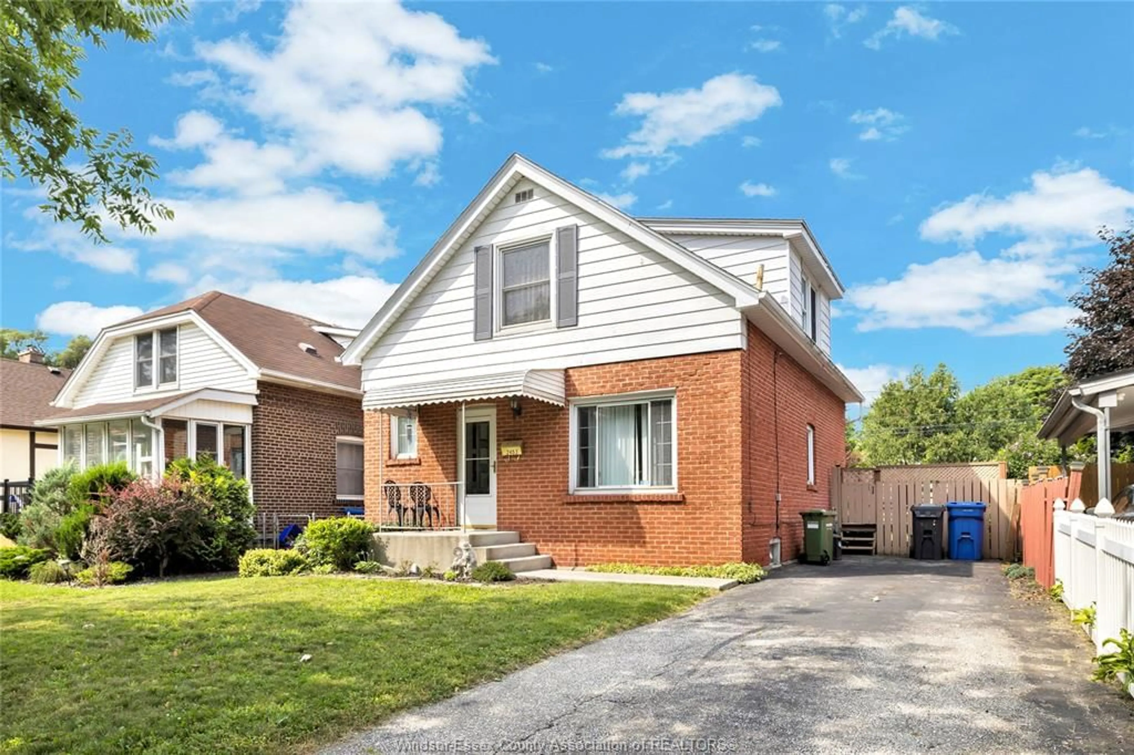 Home with brick exterior material, street for 2453 TURNER Rd, Windsor Ontario N8W 3K9