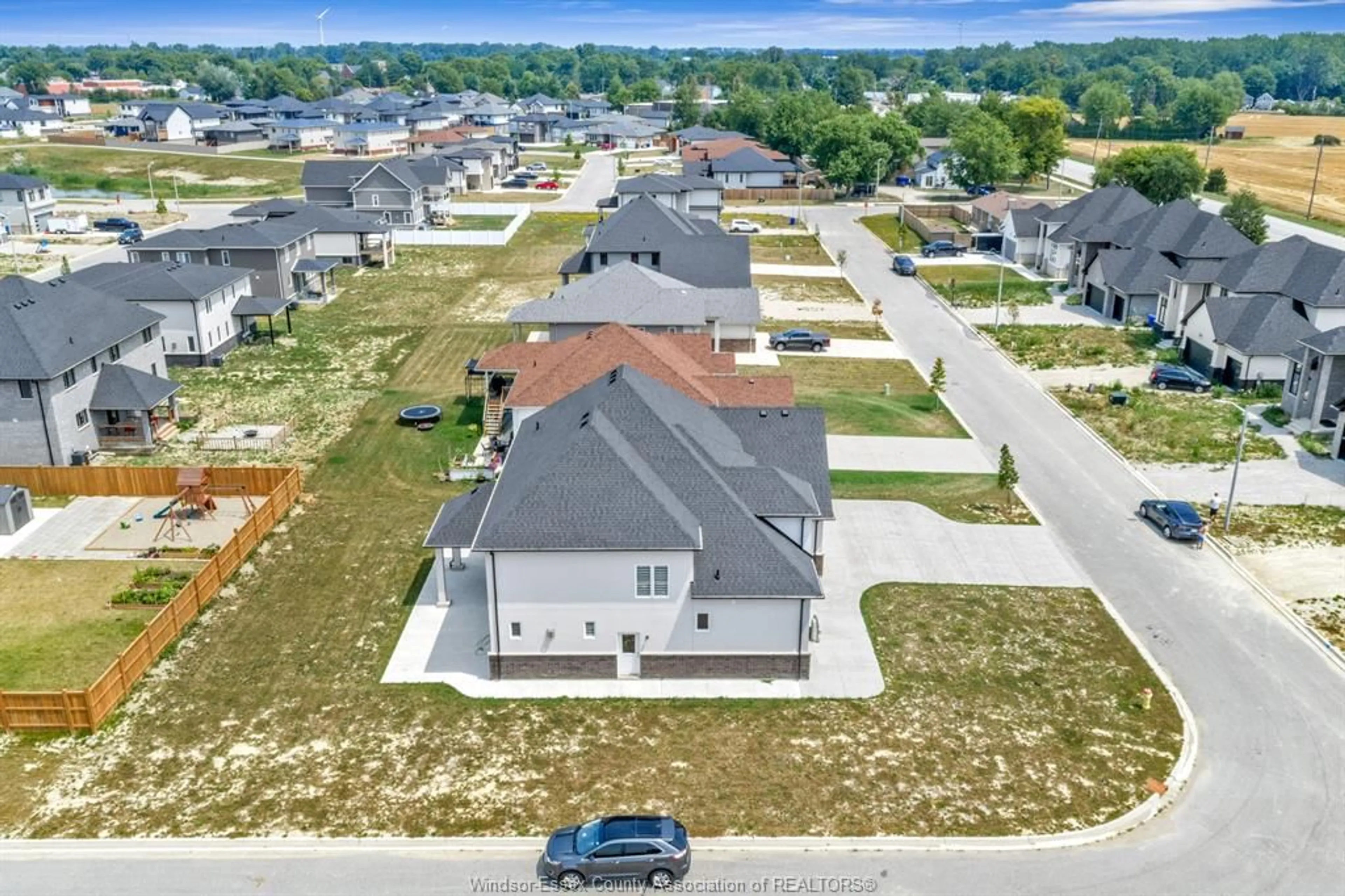 A pic from outside/outdoor area/front of a property/back of a property/a pic from drone, street for 4411 BELMONT Ave, Lakeshore Ontario N0P 1J0
