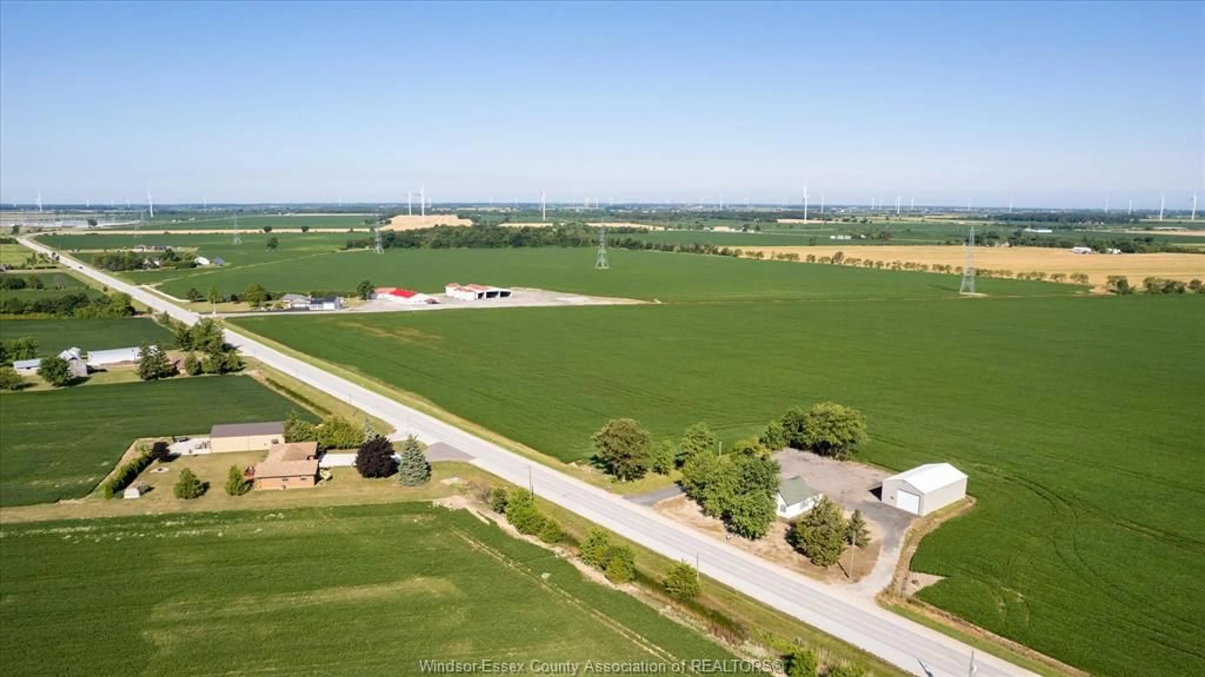 A pic from outside/outdoor area/front of a property/back of a property/a pic from drone, water/lake/river/ocean view for 3500 County Rd 46, Lakeshore Ontario N0P 1J0