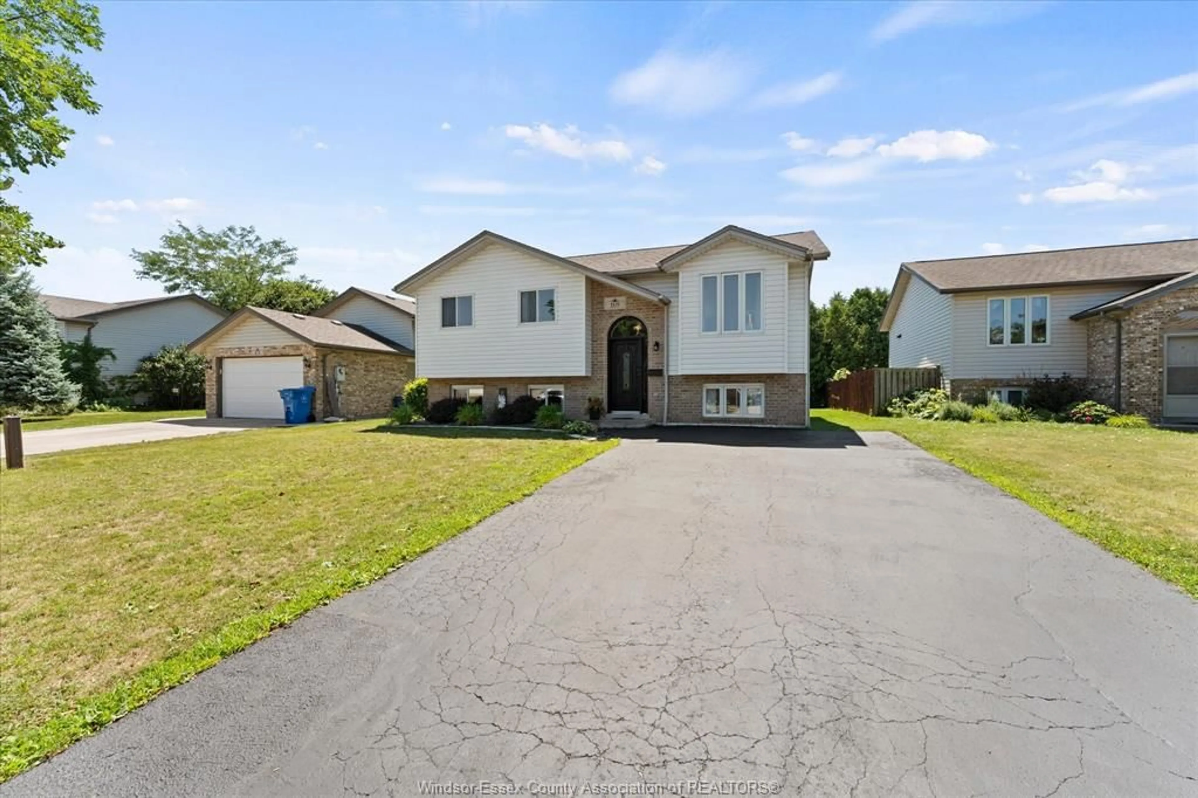 Home with vinyl exterior material, street for 169 MEDITERRANEAN Ave, Amherstburg Ontario N9V 3X9