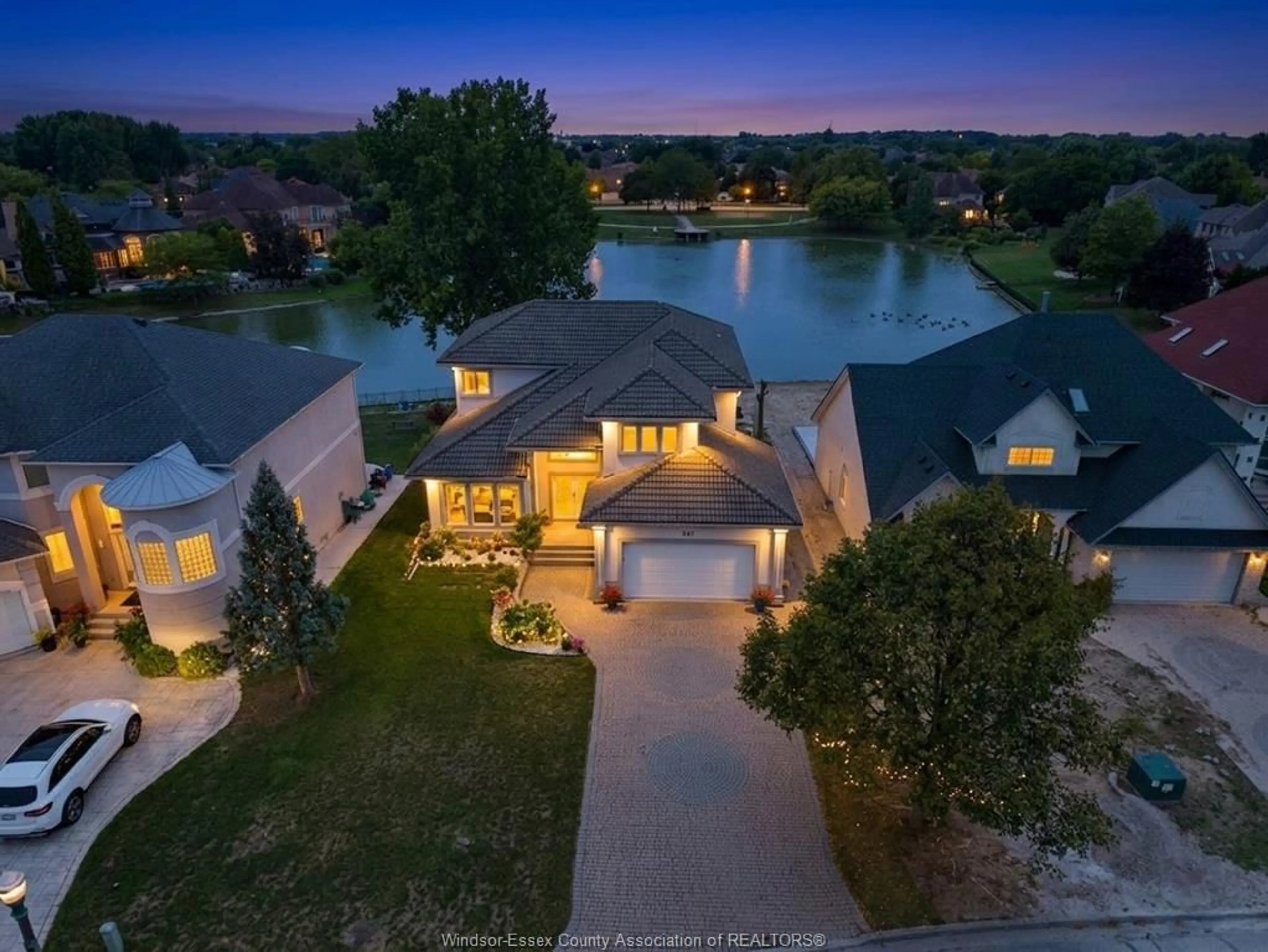 A pic from outside/outdoor area/front of a property/back of a property/a pic from drone, water/lake/river/ocean view for 847 LAKE SHORE Dr, Windsor Ontario N9G 2R1