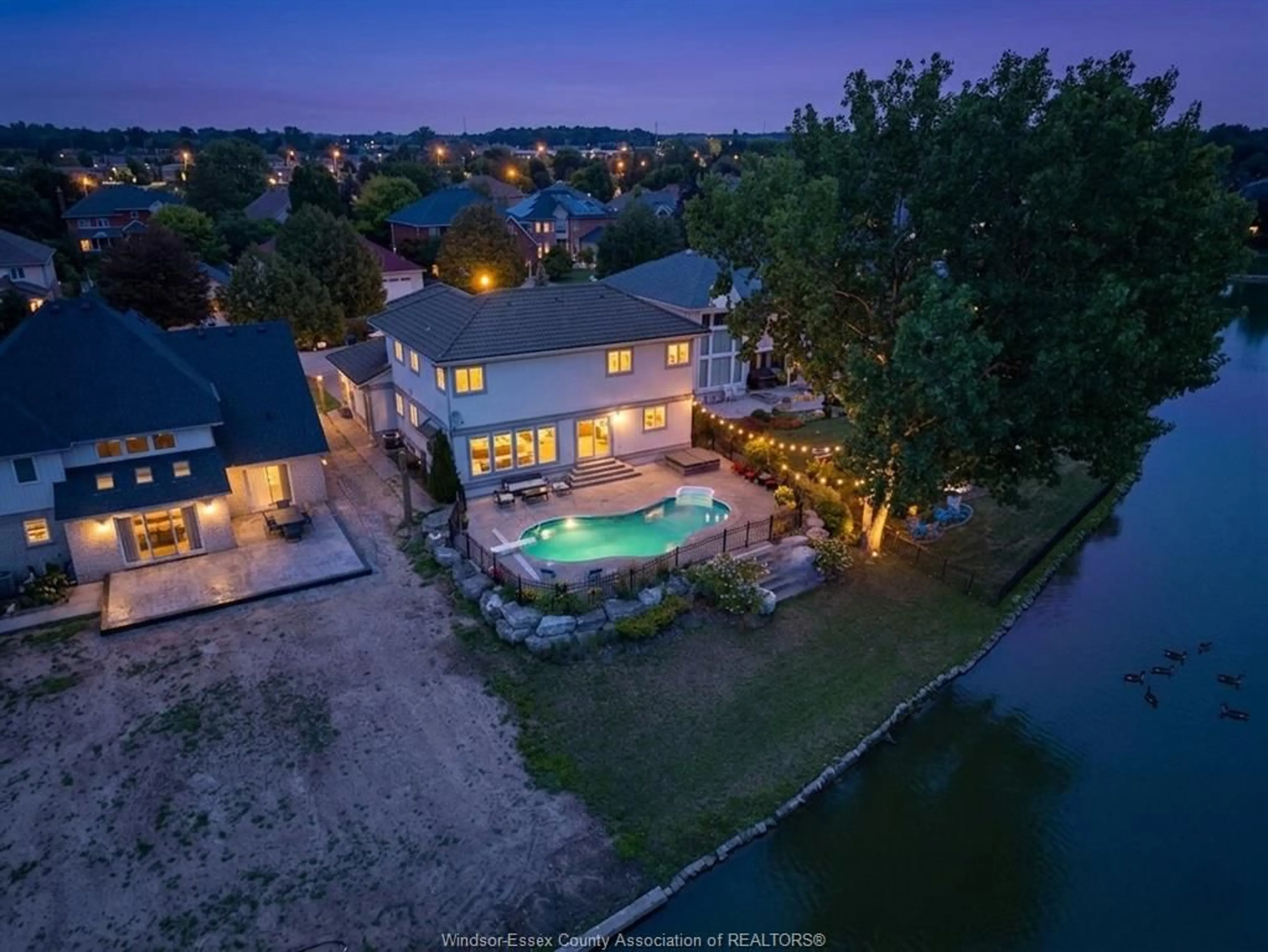 A pic from outside/outdoor area/front of a property/back of a property/a pic from drone, water/lake/river/ocean view for 847 LAKE SHORE Dr, Windsor Ontario N9G 2R1