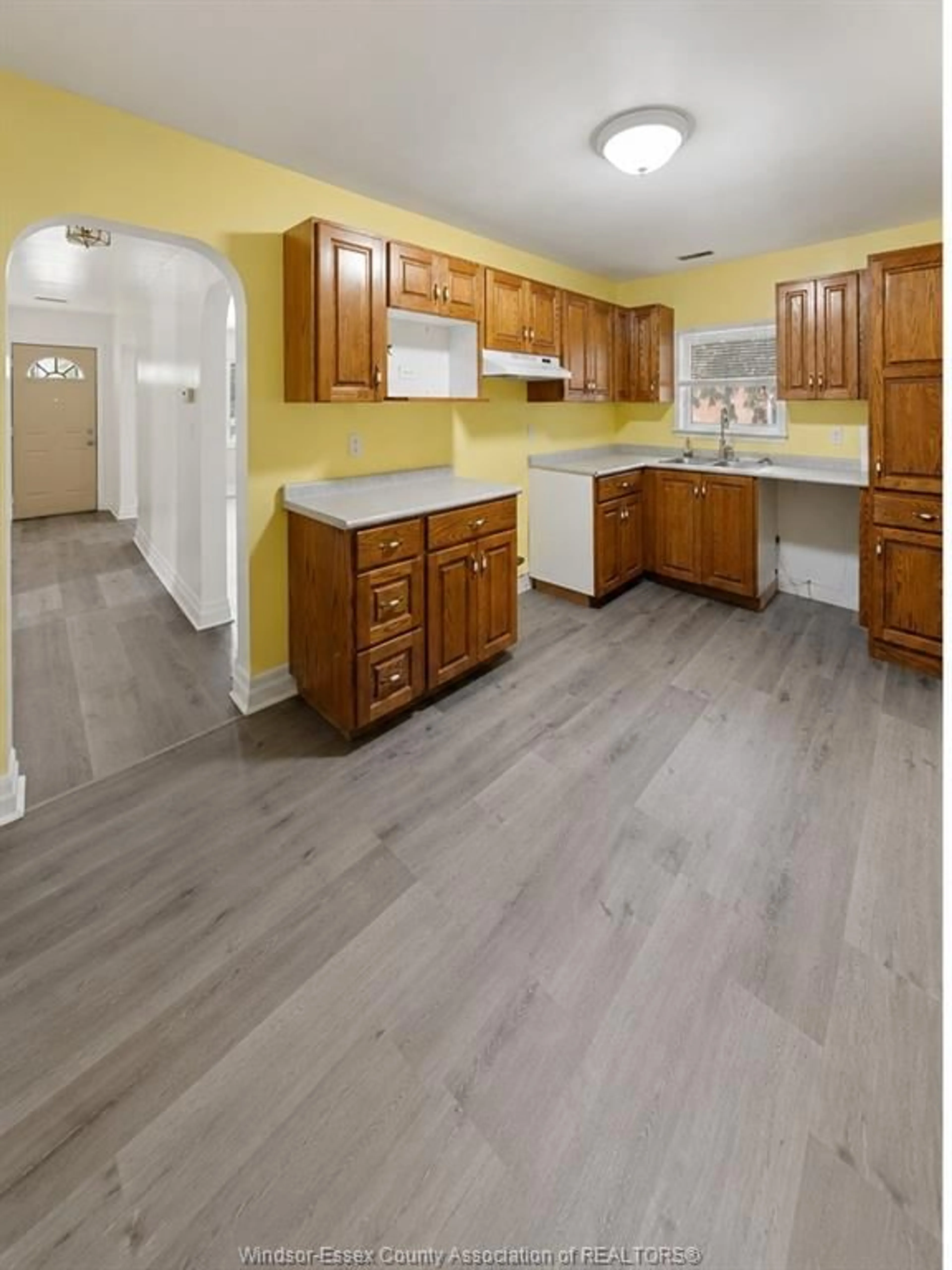 Open concept kitchen, wood/laminate floor for 1589 DROUILLARD, Windsor Ontario N8Y 2S1